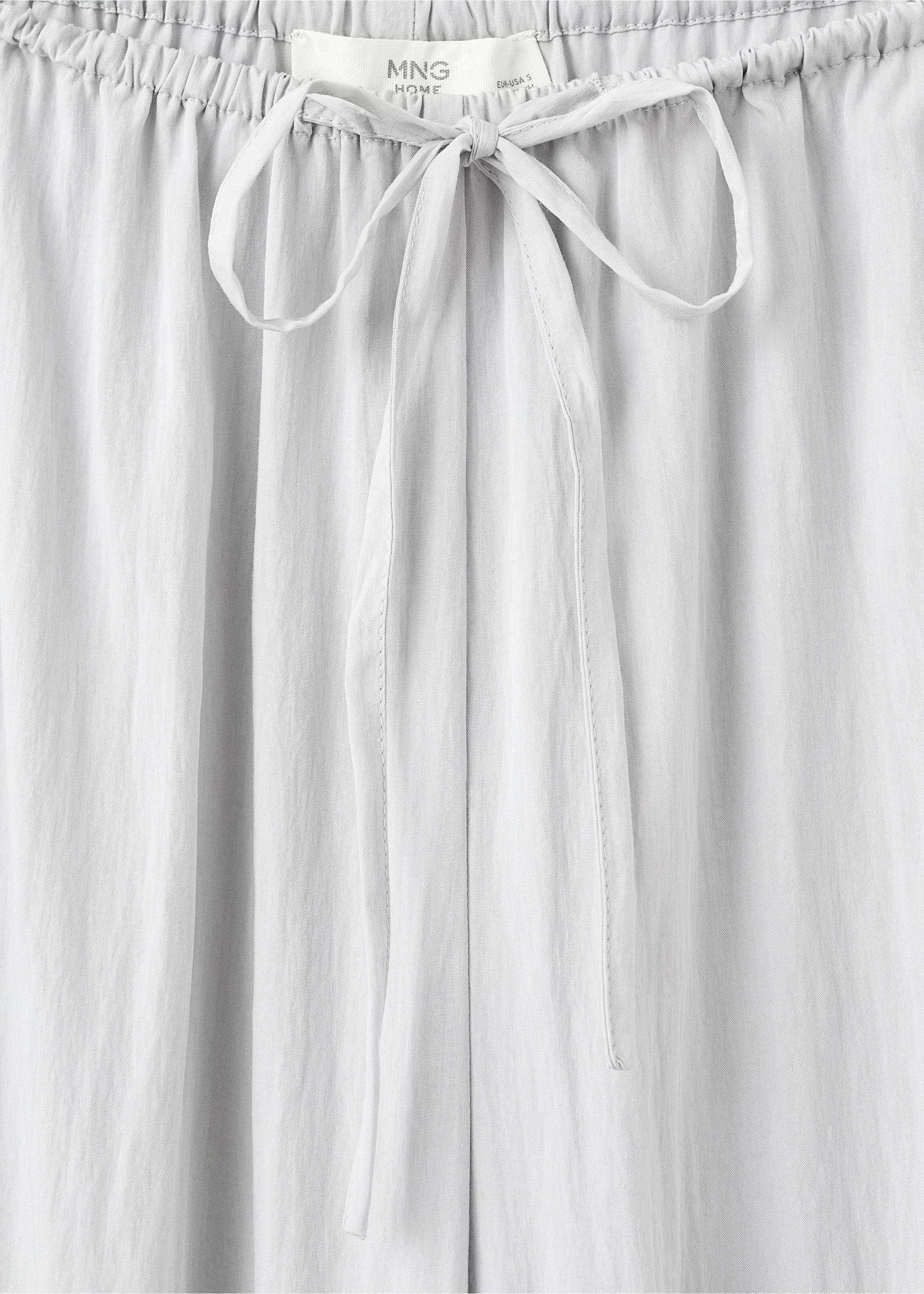 Grey pyjama trousers detail showing the elasticated waistband and drawstring., Light/Pastel Grey. Ref: 17054106-00.