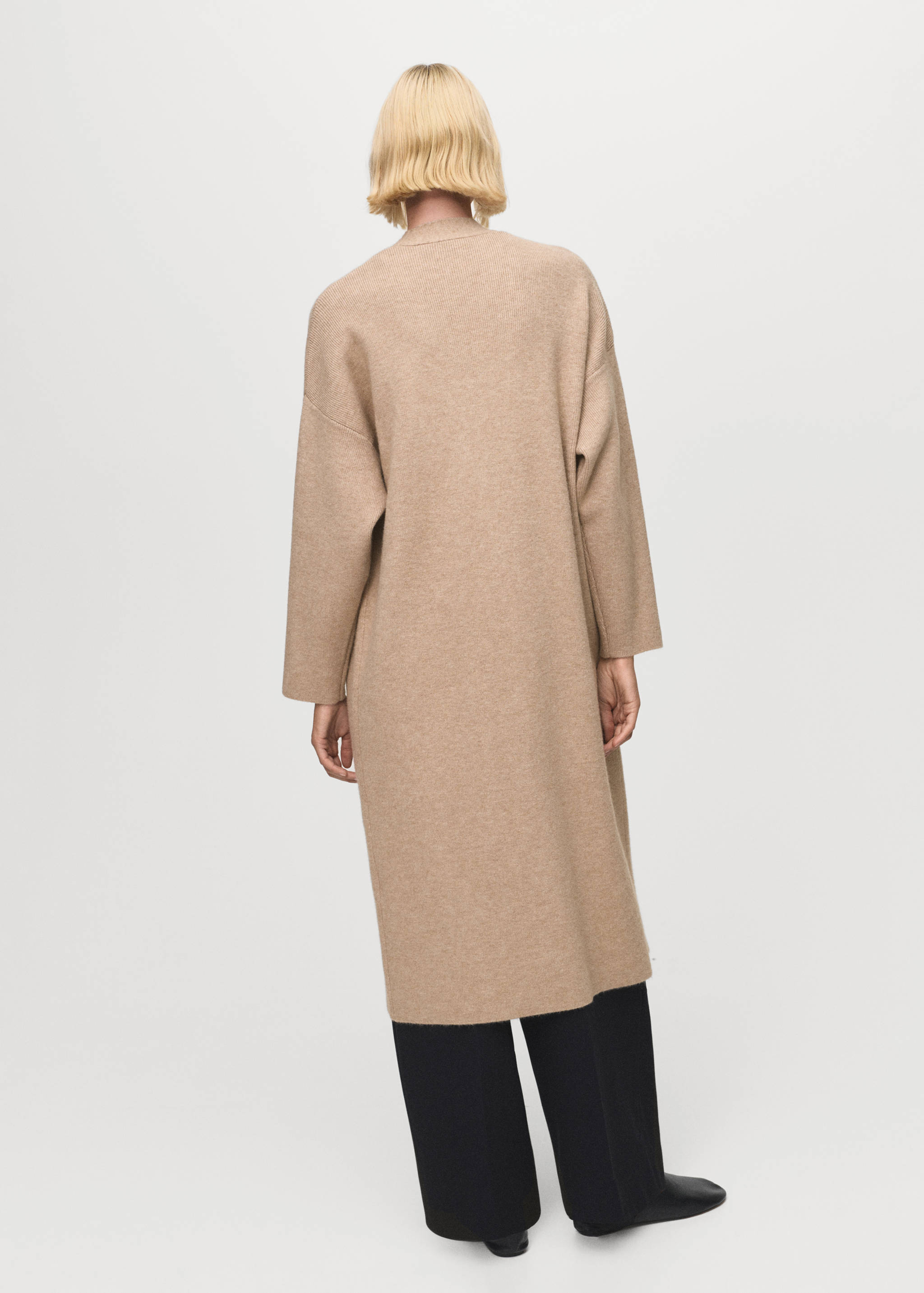 Long knitted coat - Reverse of the article