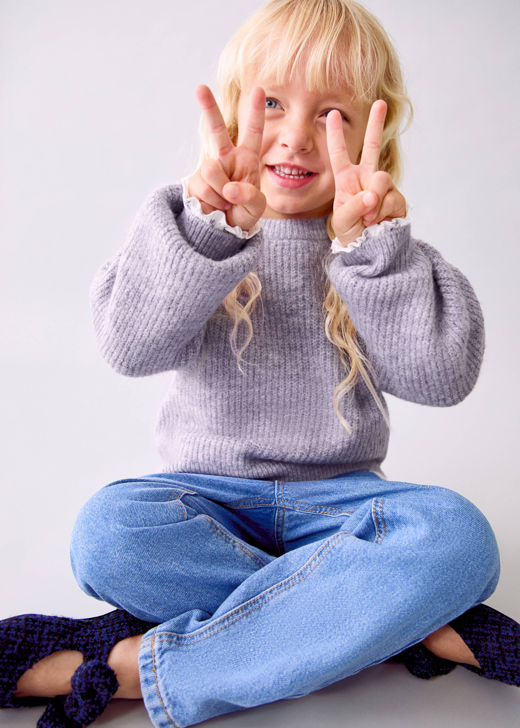 Knitted ribbed sweater - Medium plane