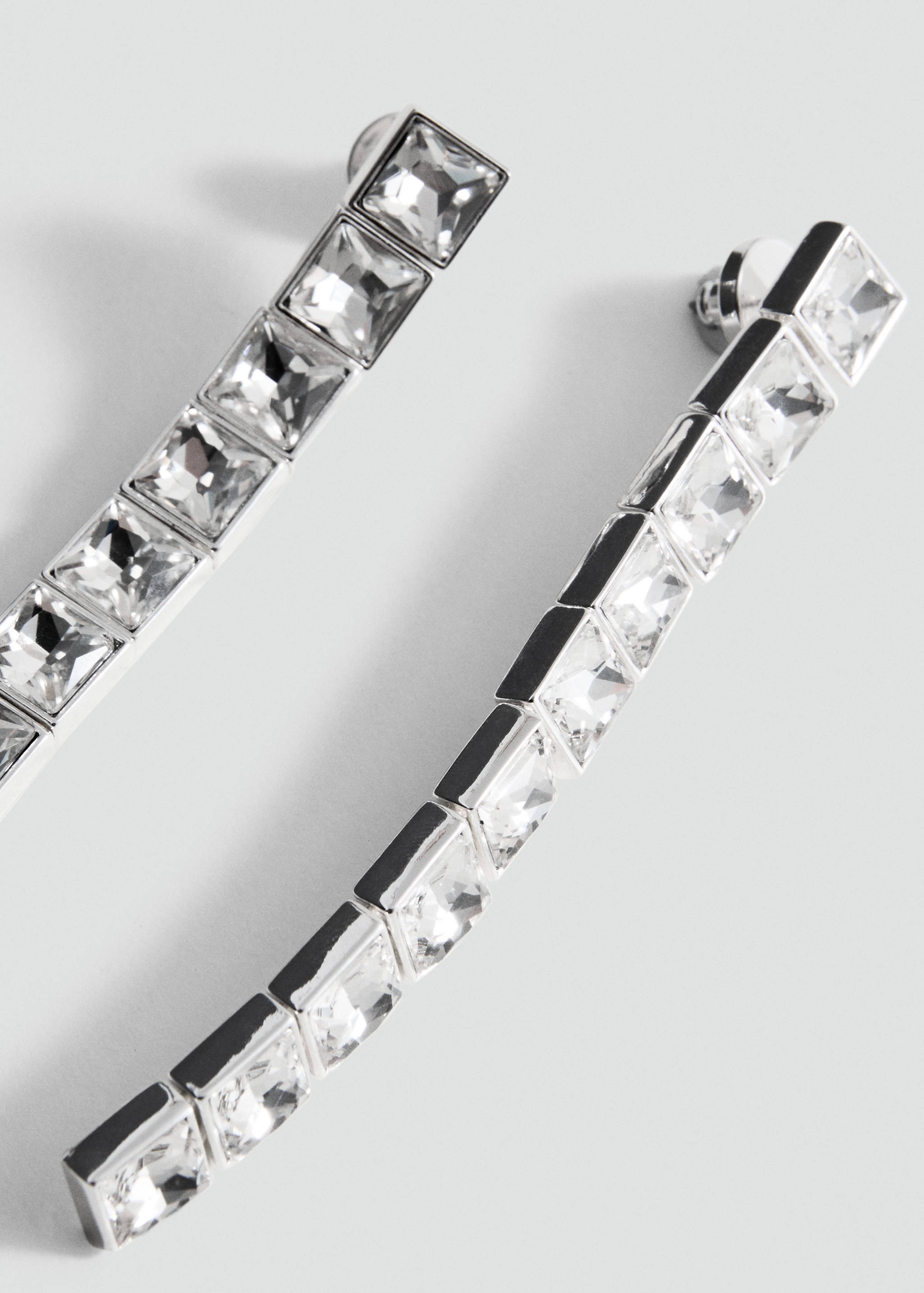 Boucles d’oreilles avec un pendentif en cristaux - Détail de l'article 1