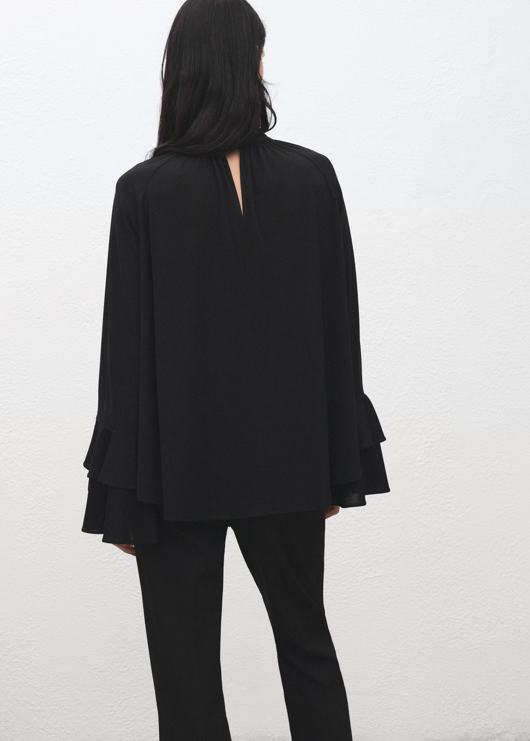 Blouse with flared sleeves and ruffles - Reverse of the article