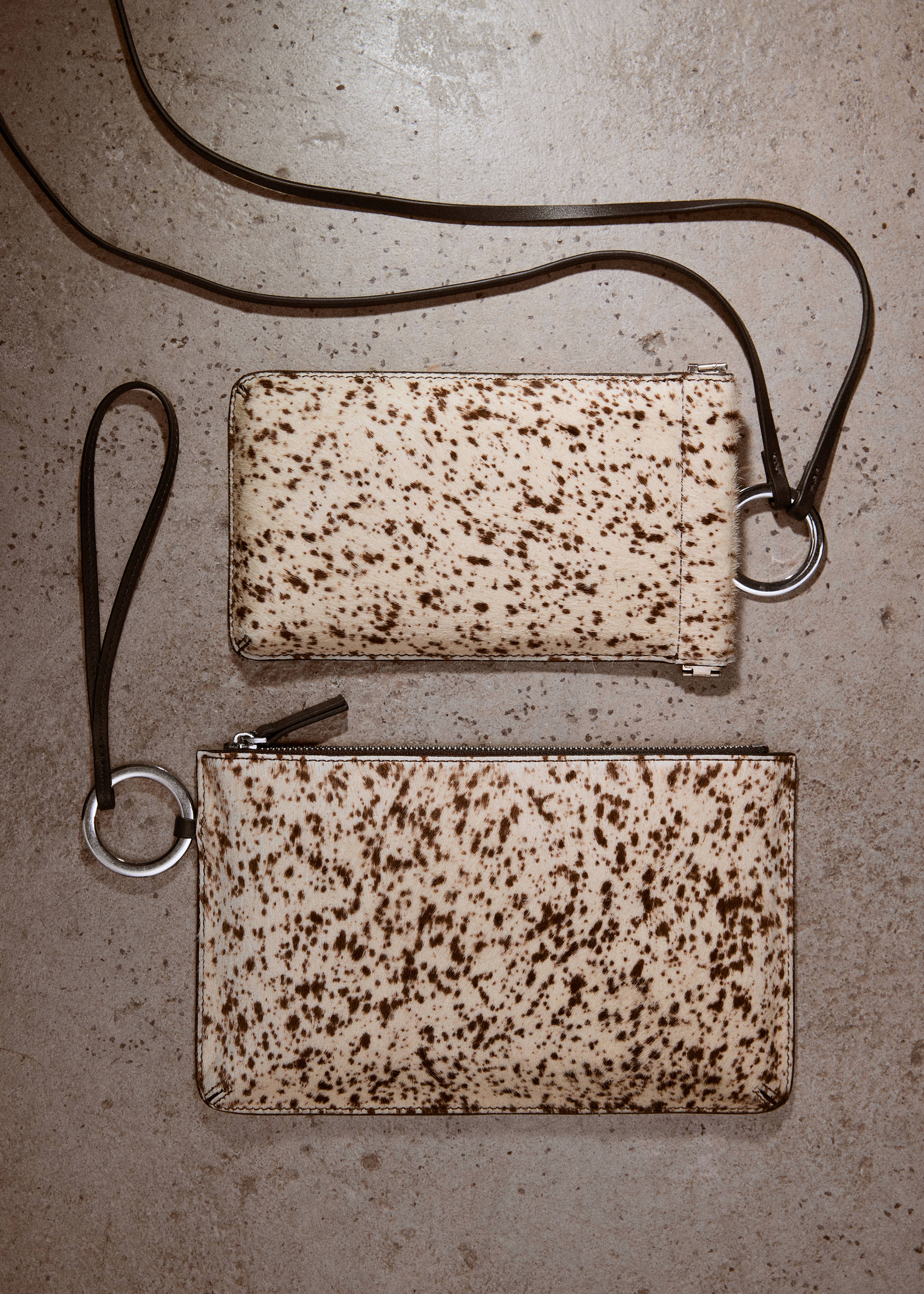 Pochette van leer en bont - Detail van het artikel 9