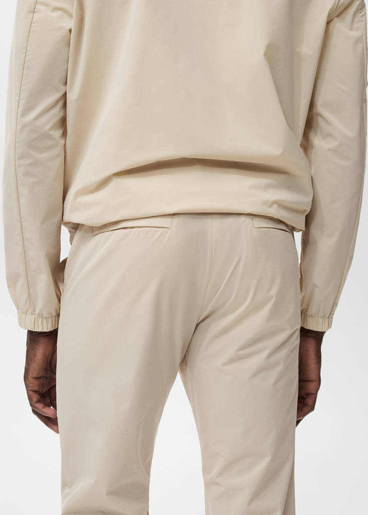 Slim fit water-repellent trousers — Beige