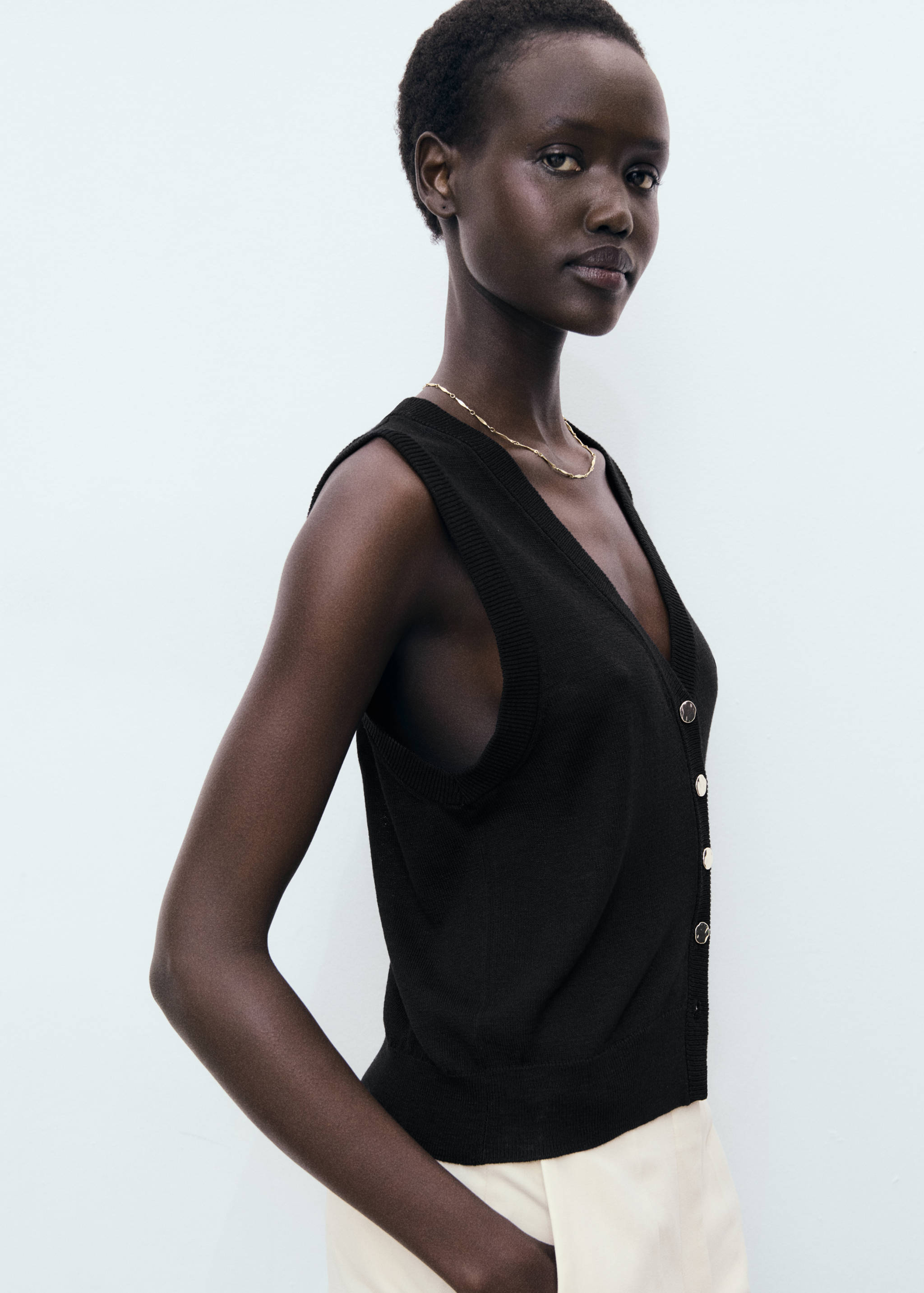 صدرية بالحياكة الدقيقة بأزرار - رؤية وسط