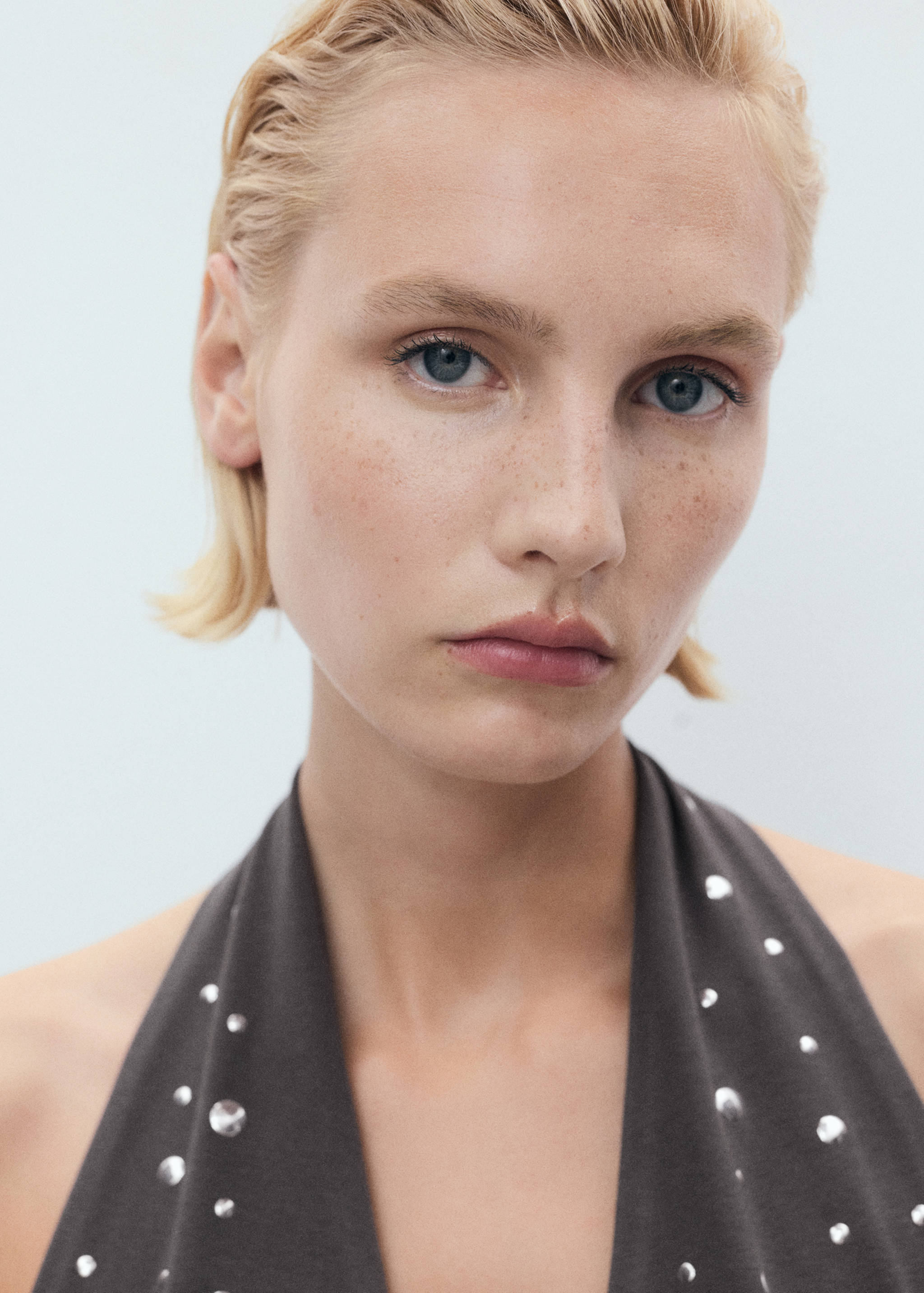 Halter top with metallic appliqués - Details of the article 1