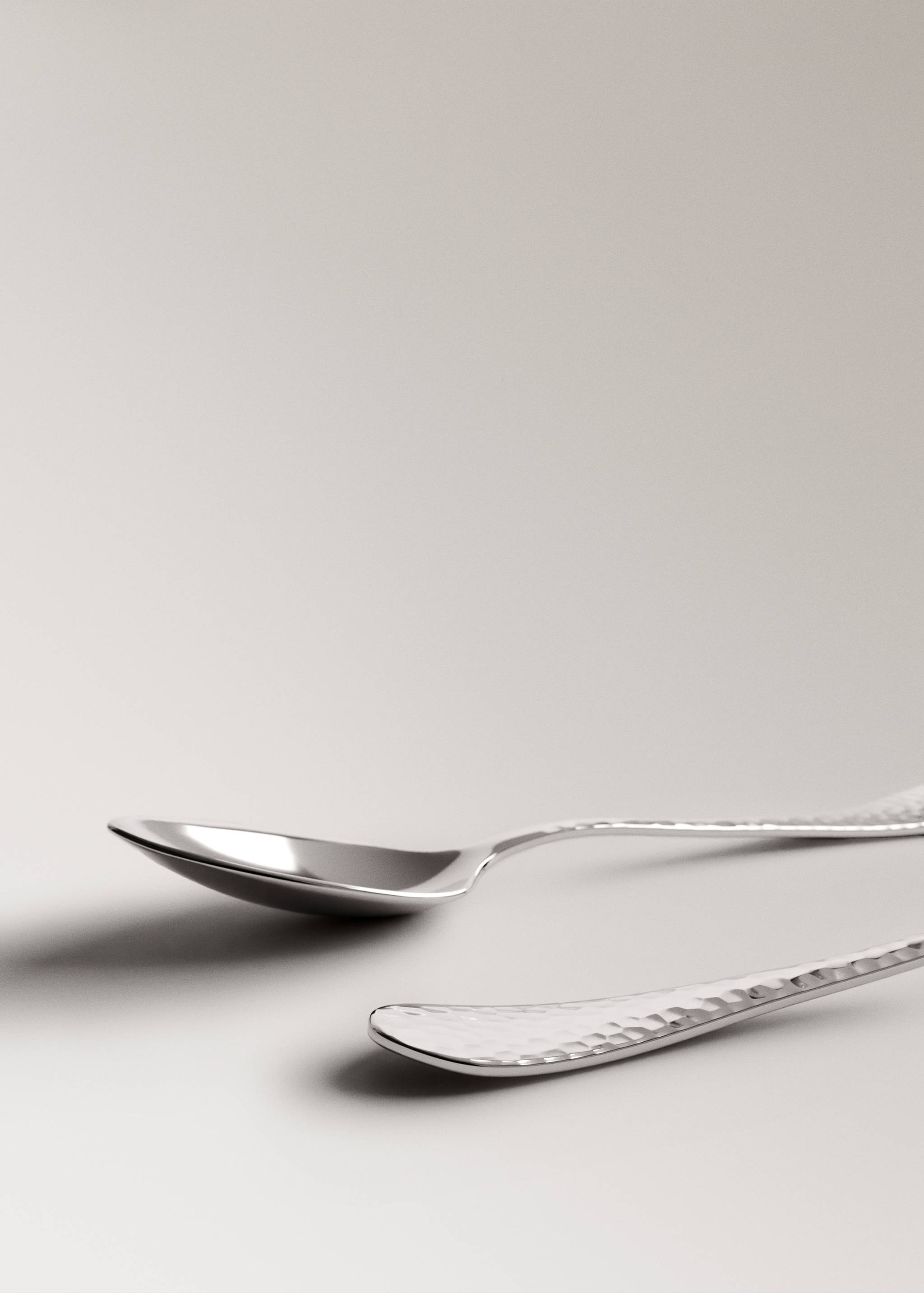 Set of 4 hammered stainless steel dessert spoons - Details of the article 2