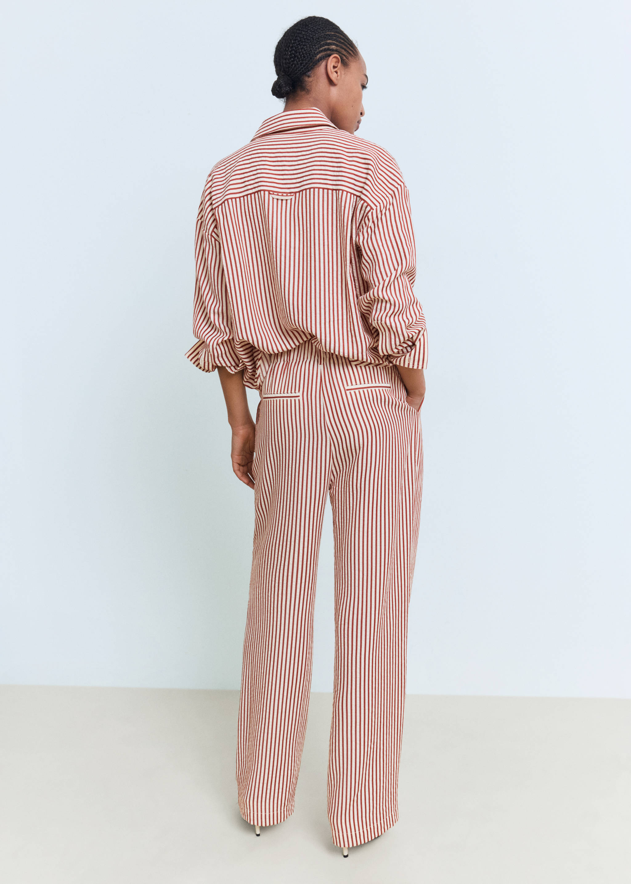 Pleated striped trousers - Reverse of the article