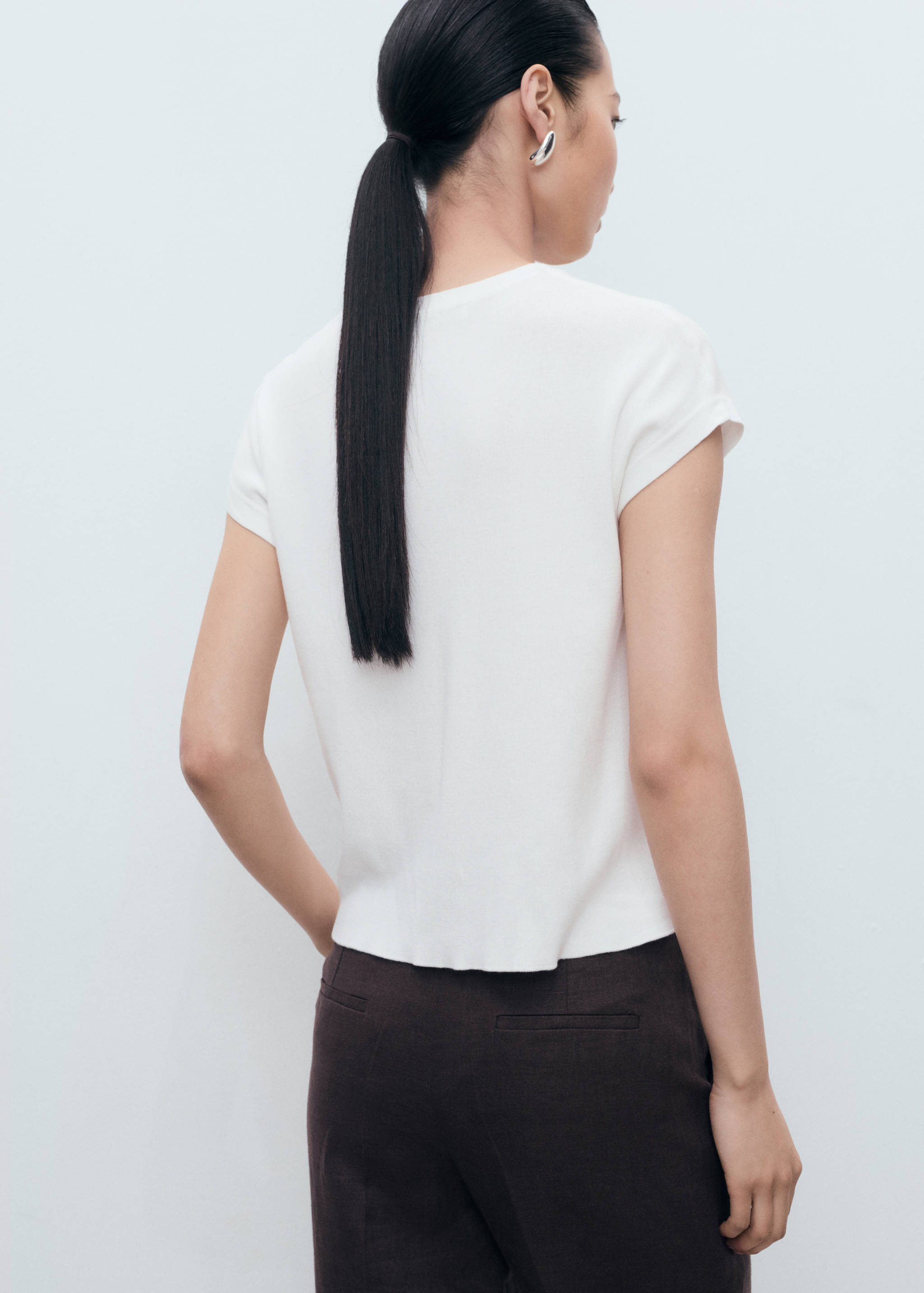 Short-sleeved knitted cotton sweater - Reverse of the article