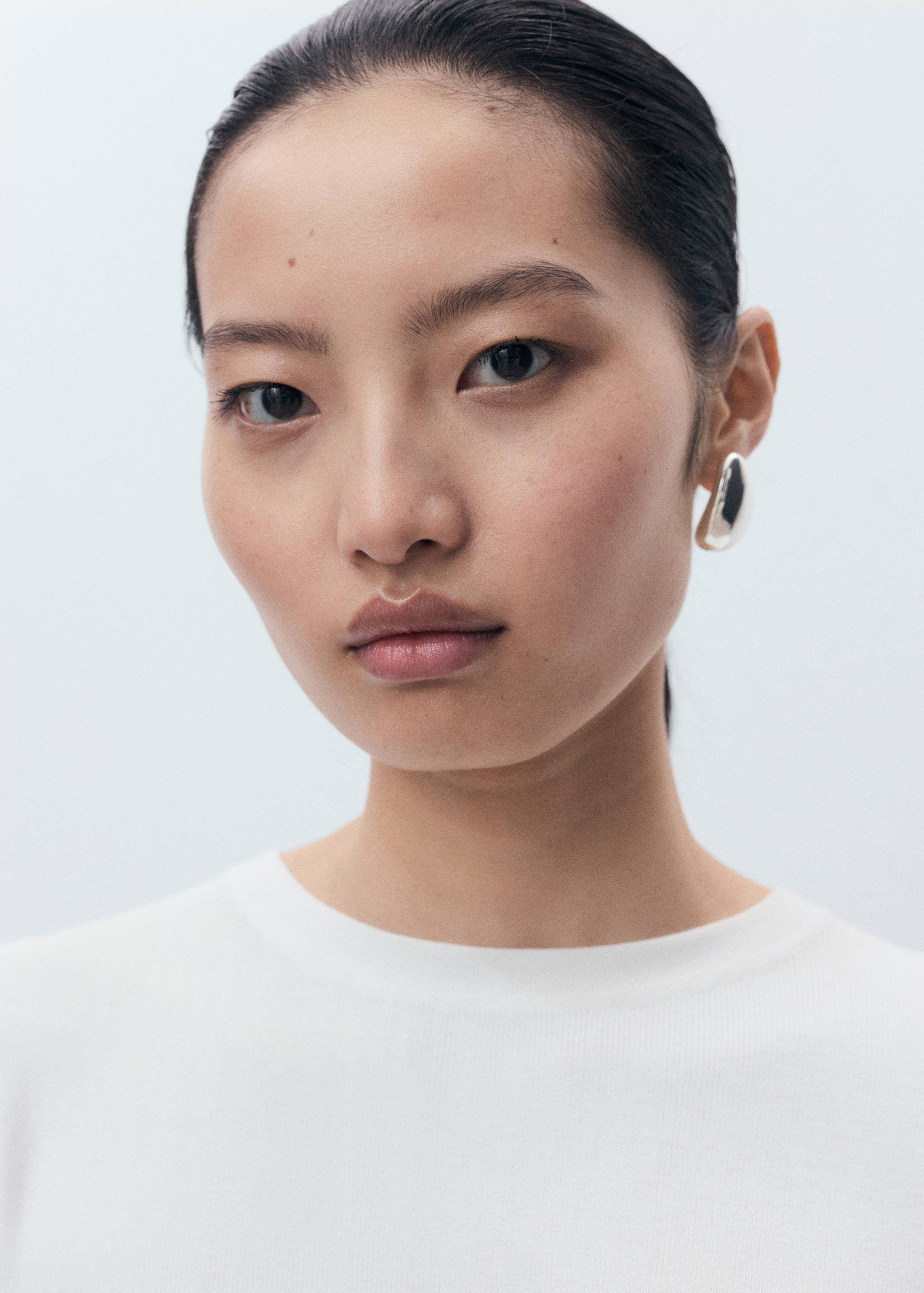 Short-sleeved knitted cotton sweater - Details of the article 1