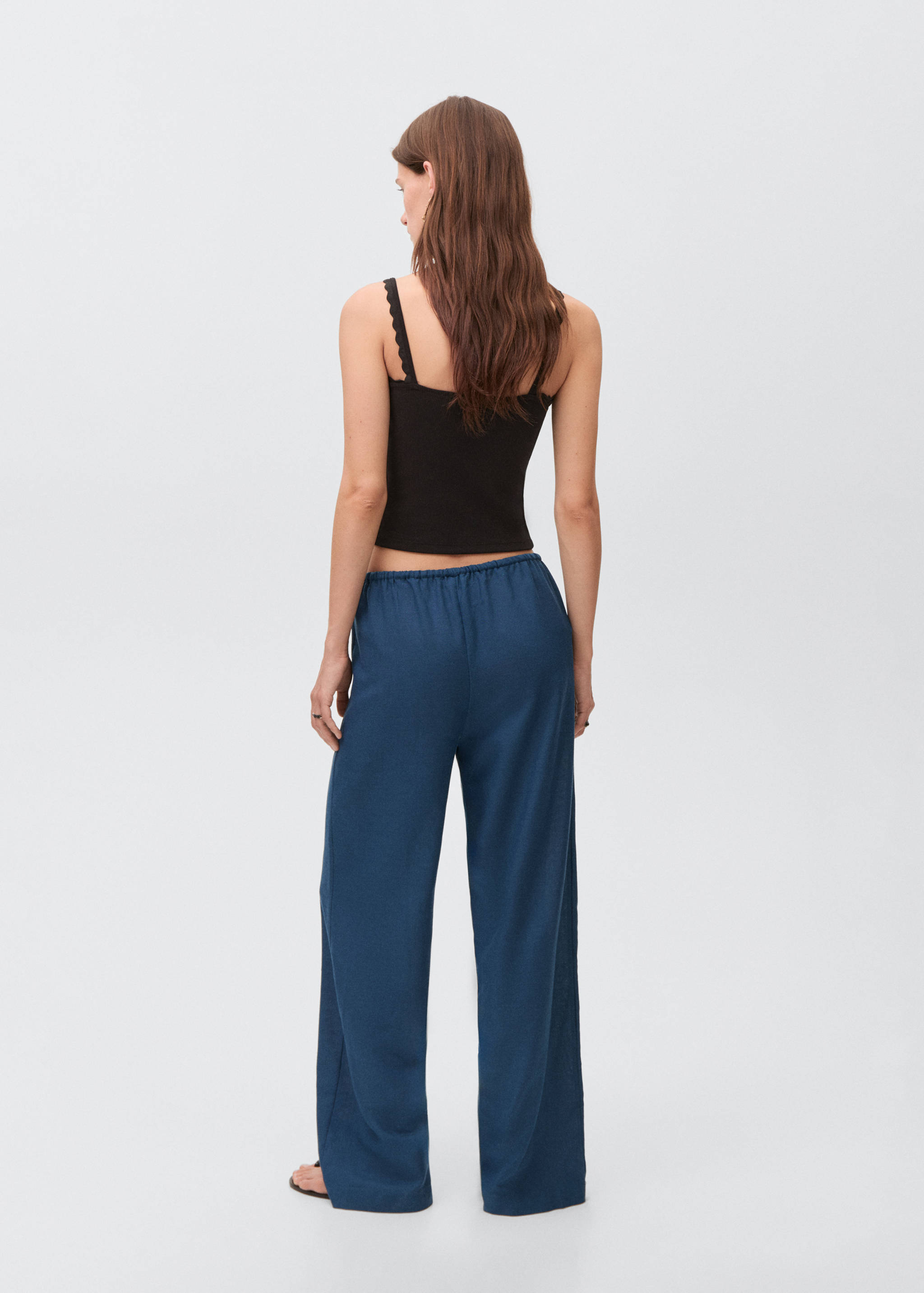 Beaded embroidered trousers - Reverse of the article