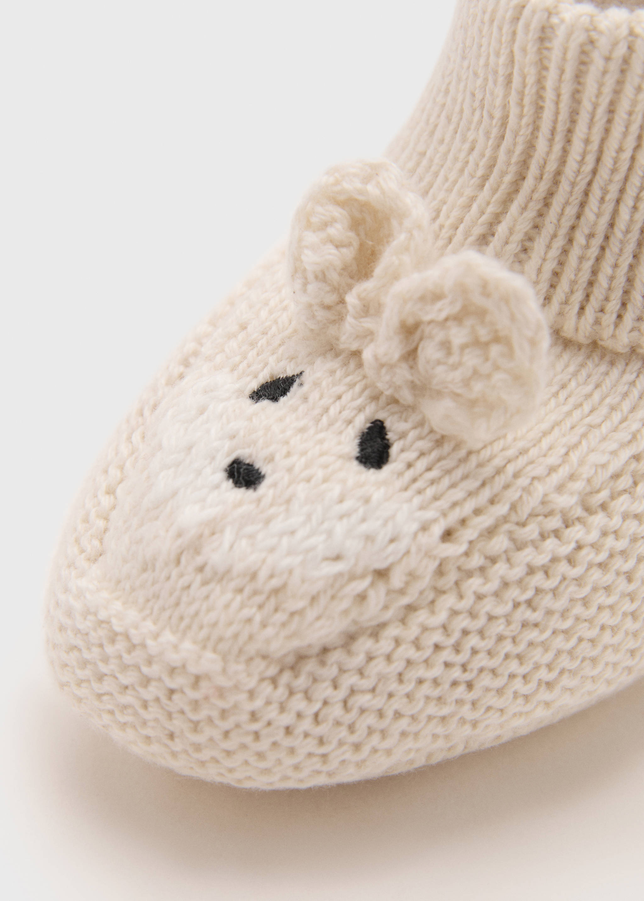Booties with little ears - Details of the article 8