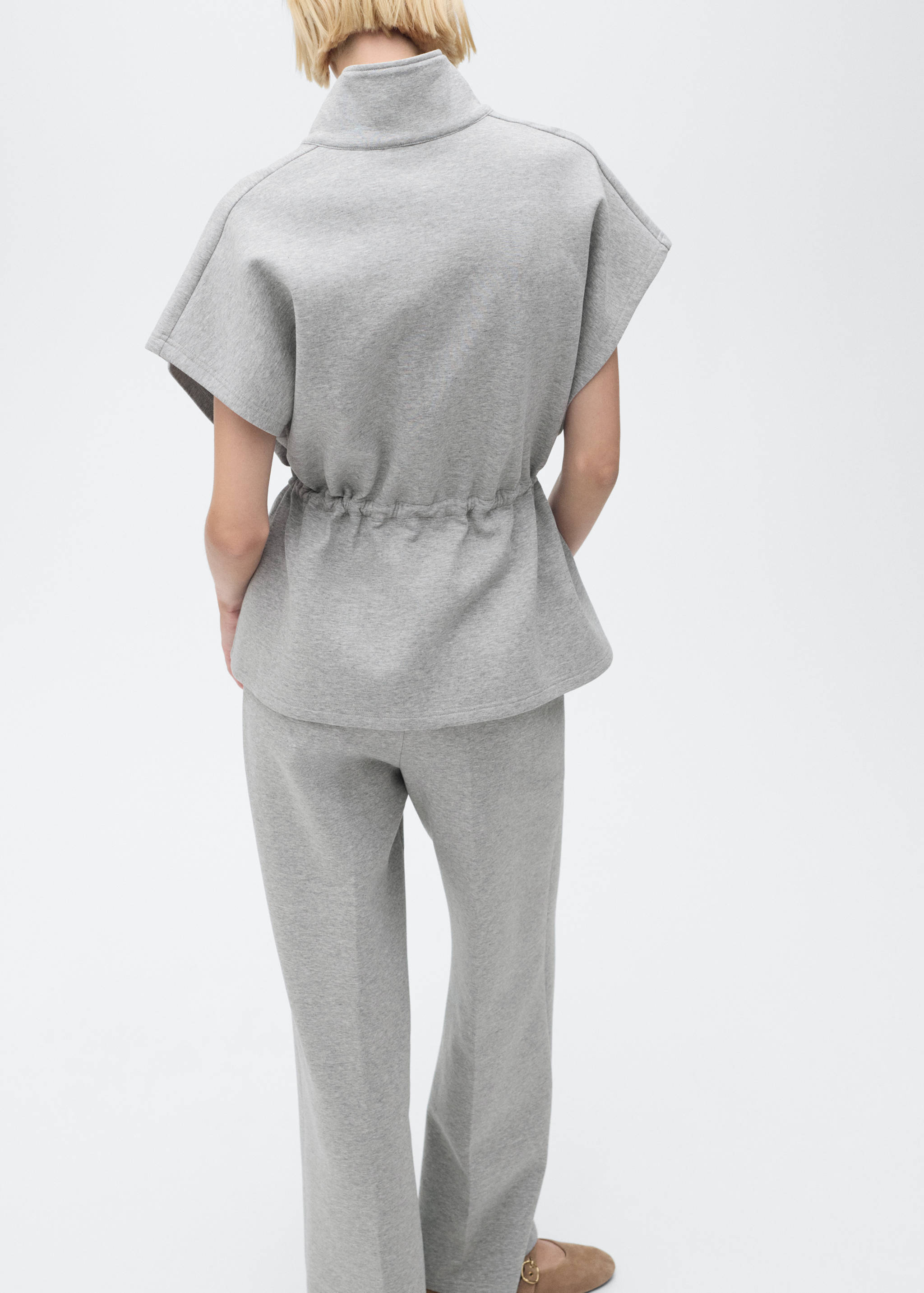 Short-sleeved jacket with adjustable waistband - Reverse of the article