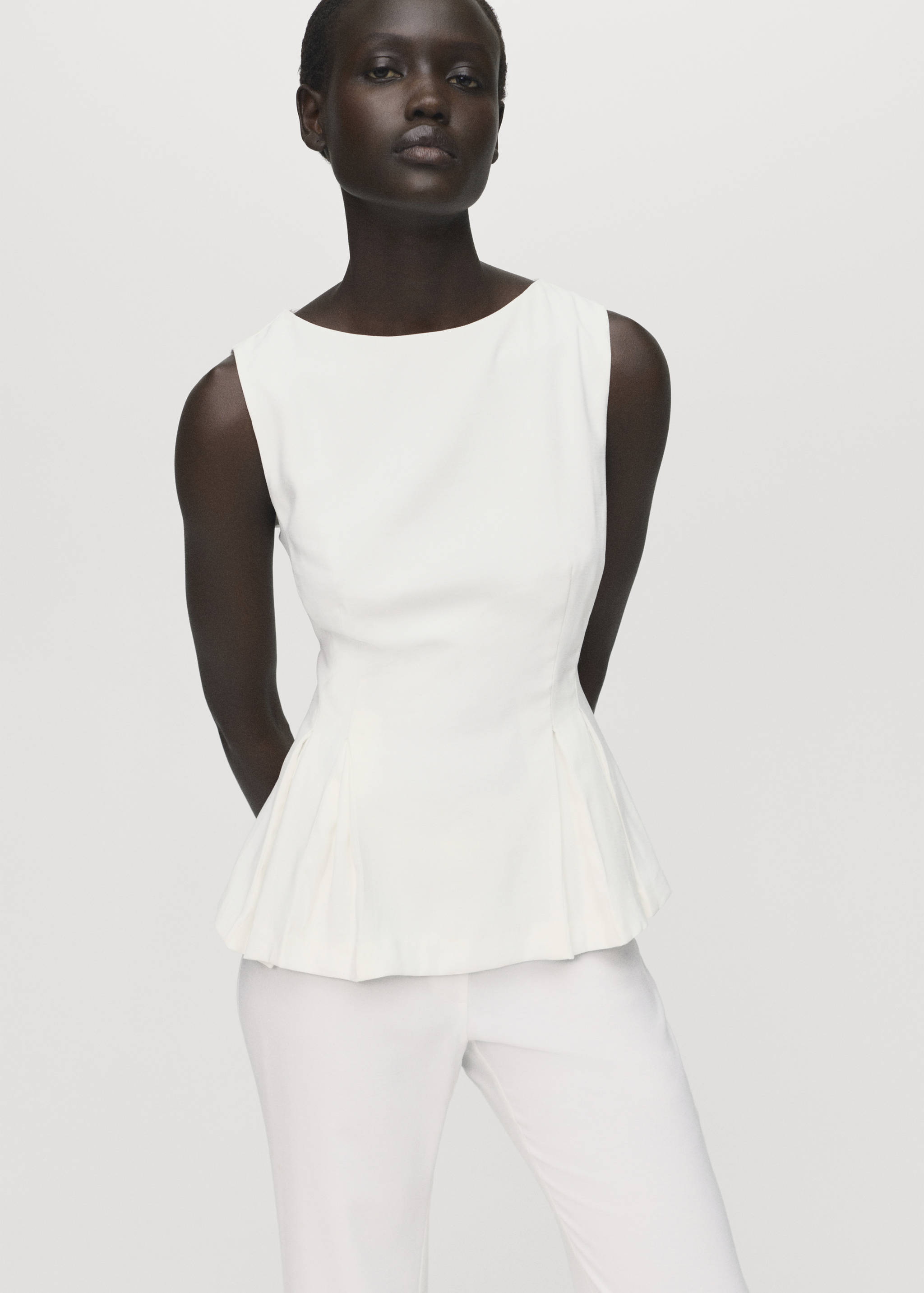 Peplum top with pleat detail - Medium plane