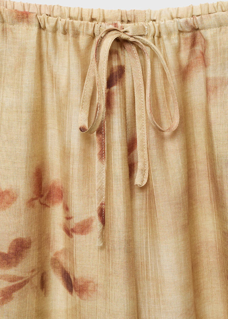 Leaf-print trousers — Sand
