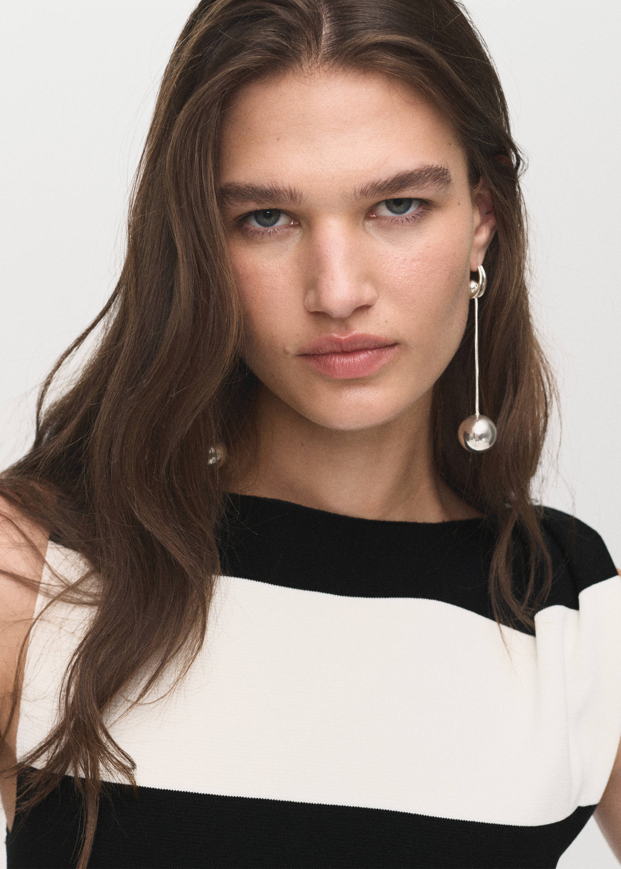 Asymmetrical knitted dress with strap - Details of the article 1