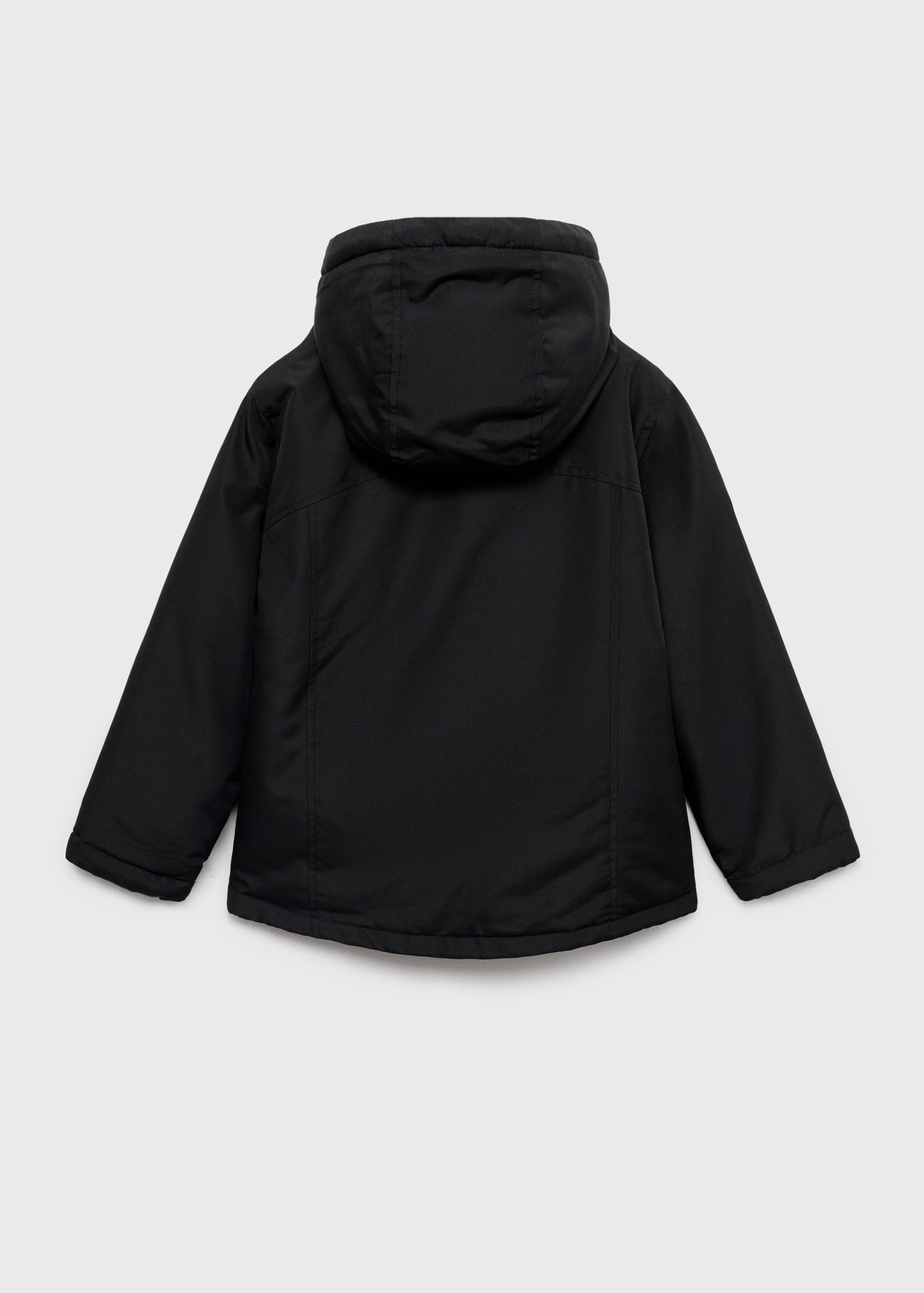 Huvad kappa - Artikelns baksida