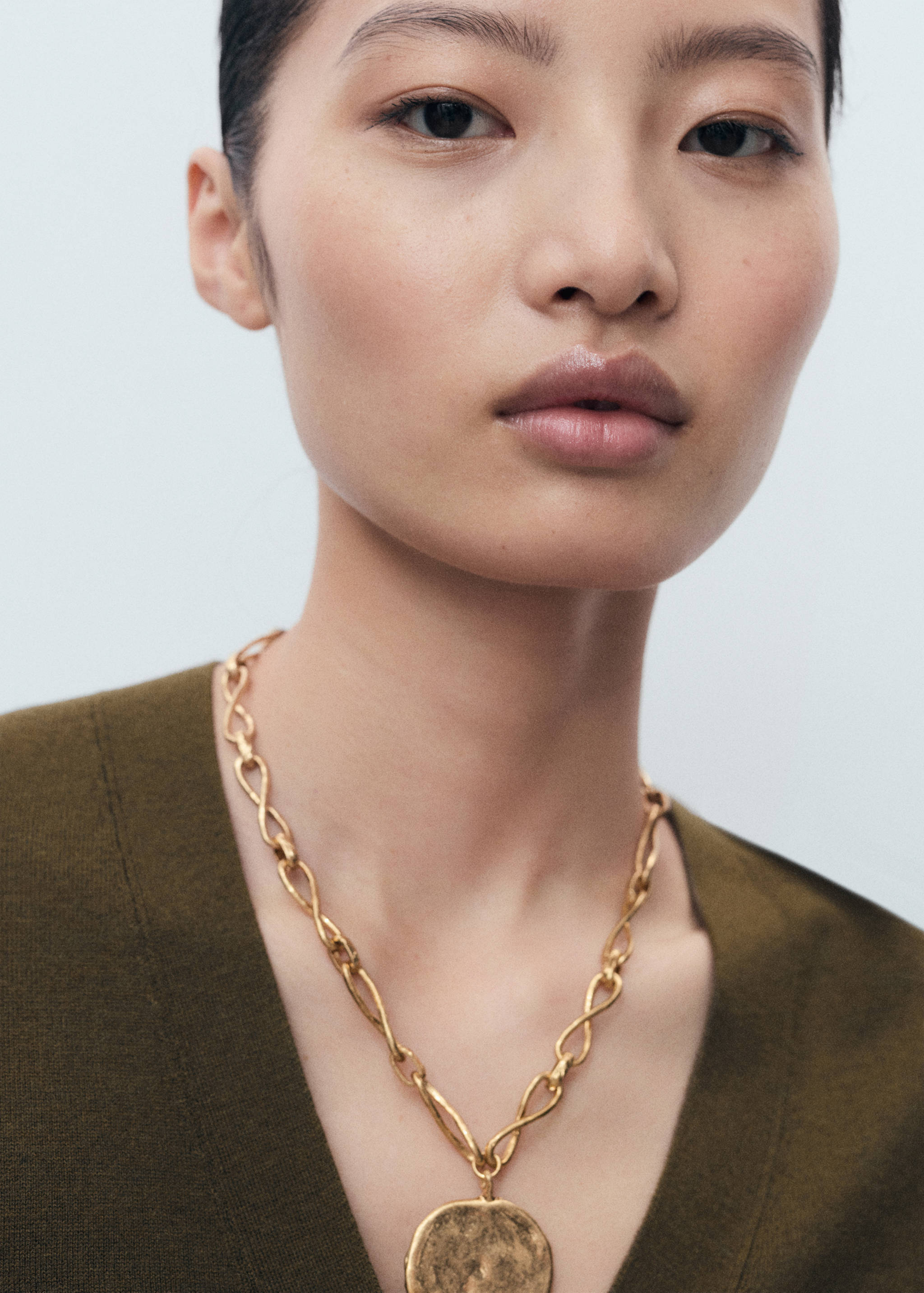 V-neck knitted cardigan - Details of the article 1