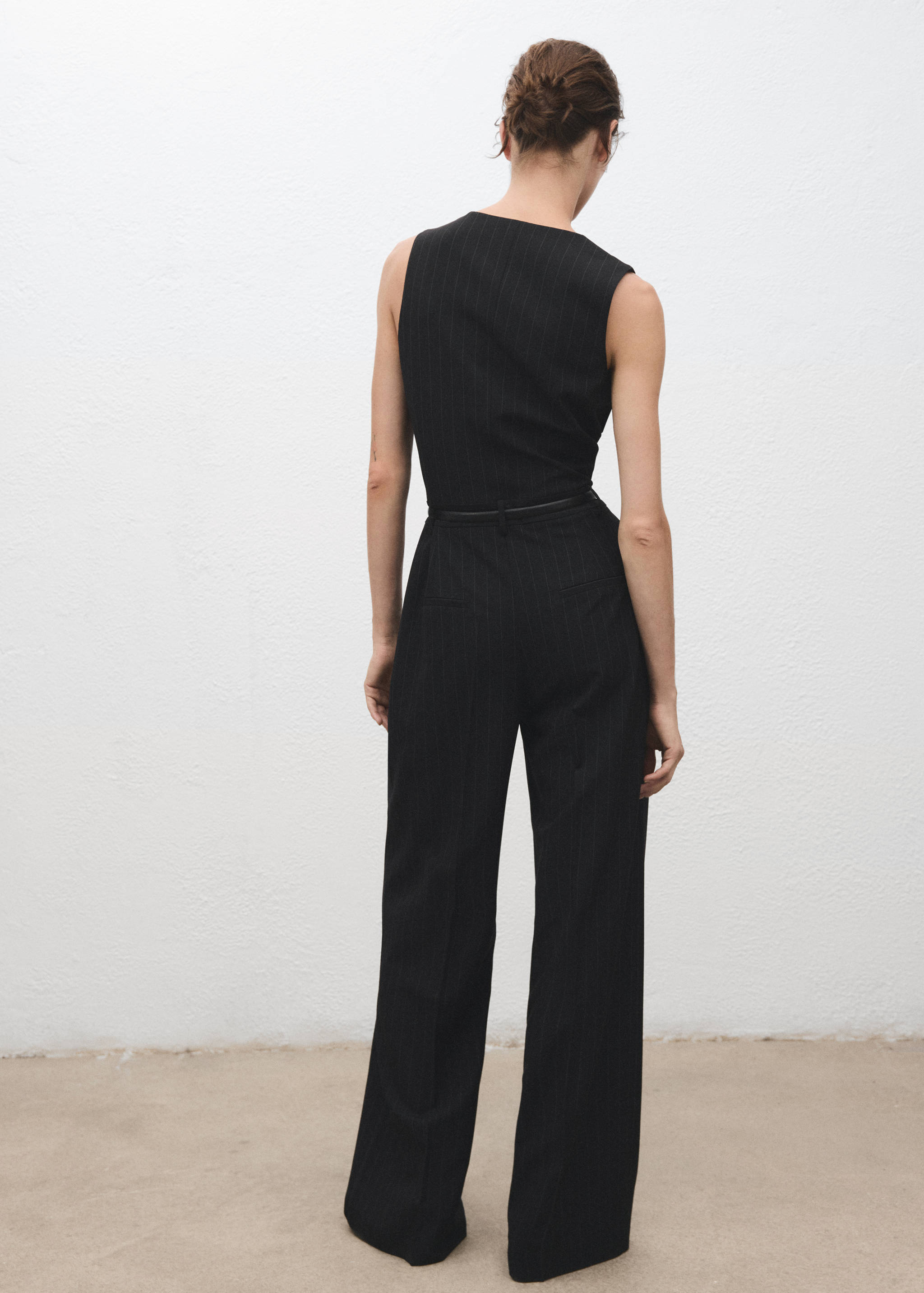 Pinstripe jumpsuit with belt - Reverse of the article