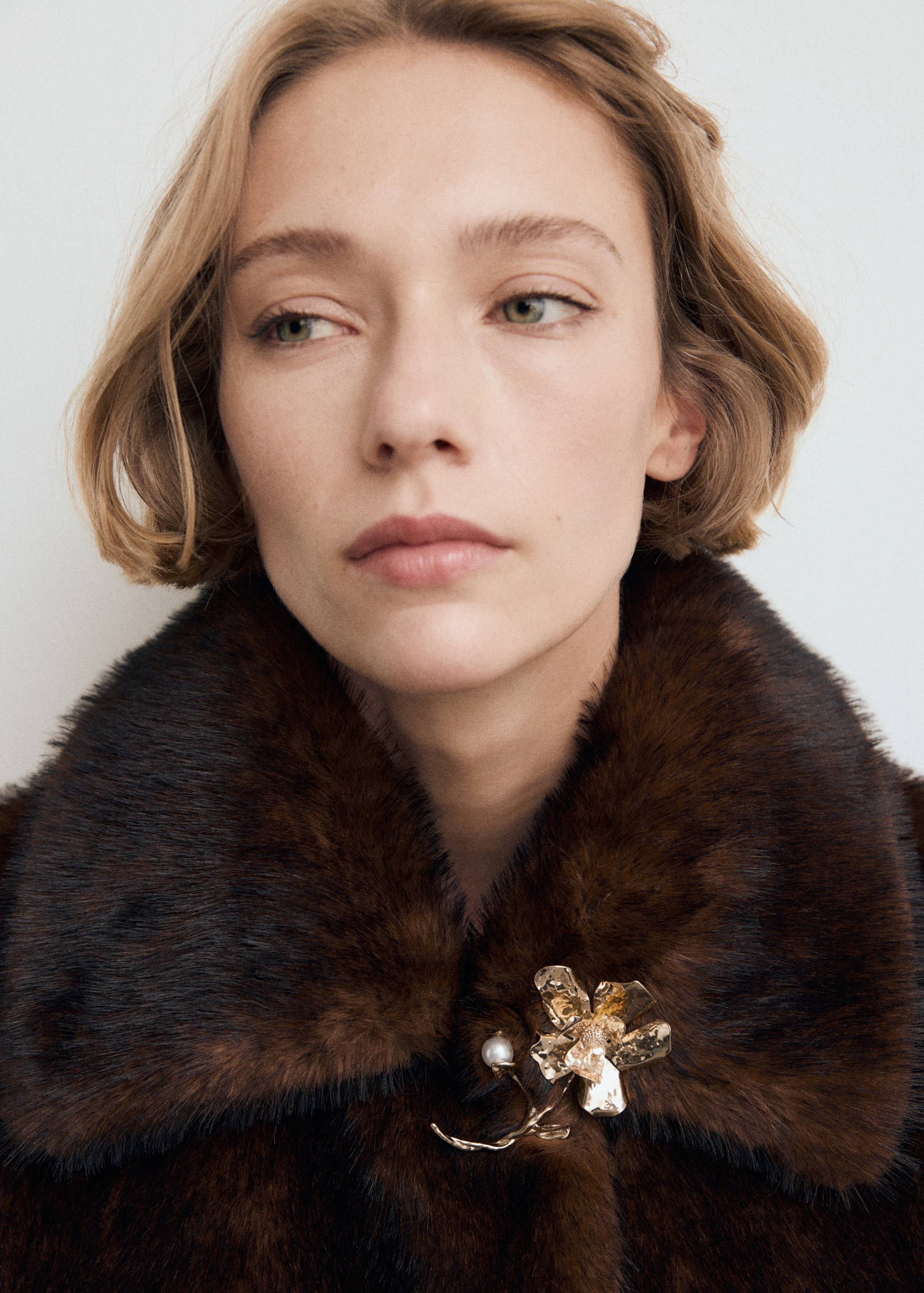 Broche de flor - Pormenor do artigo 9