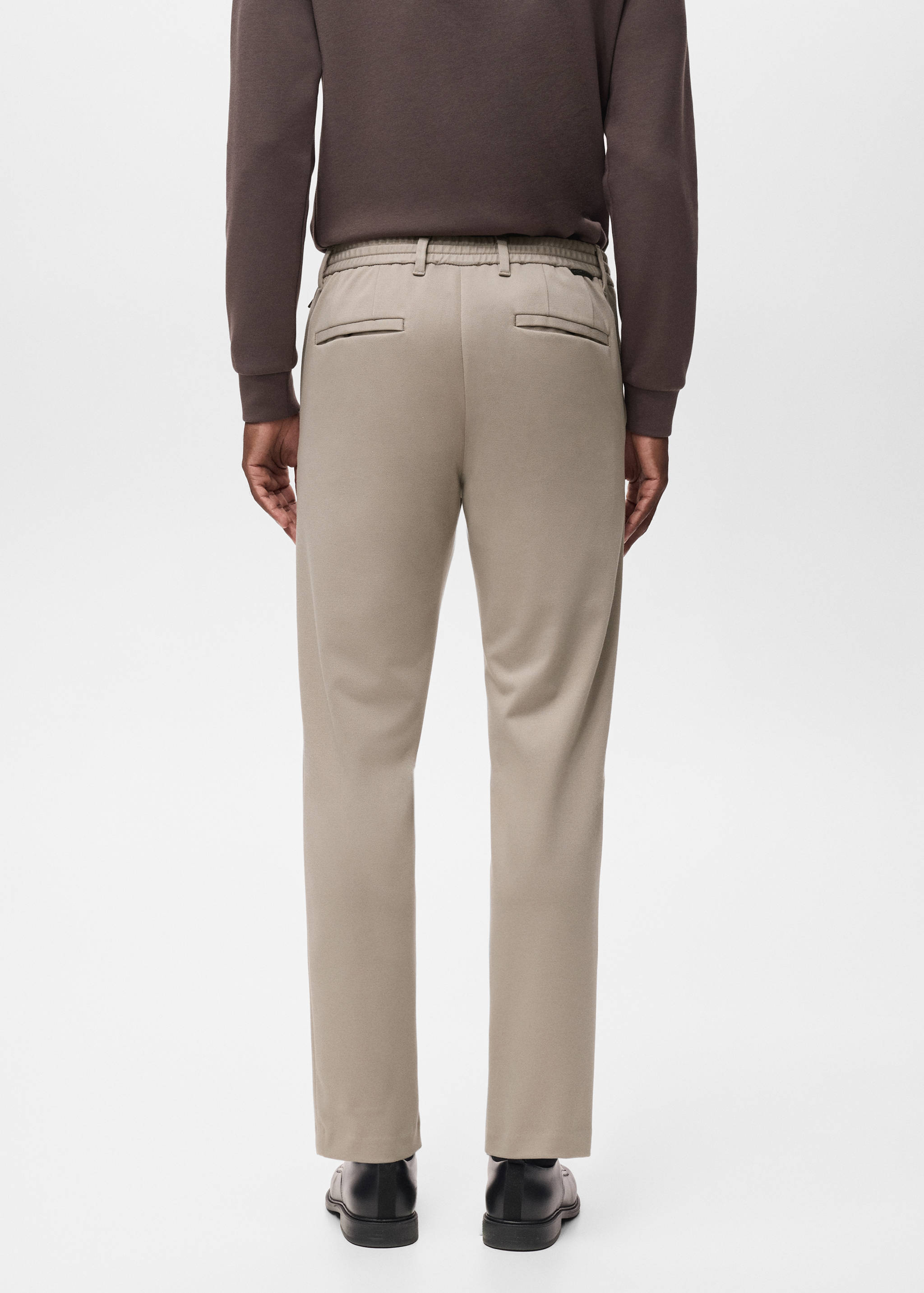 Stretch fabric slim-fit pants with drawstring - Reverse of the article