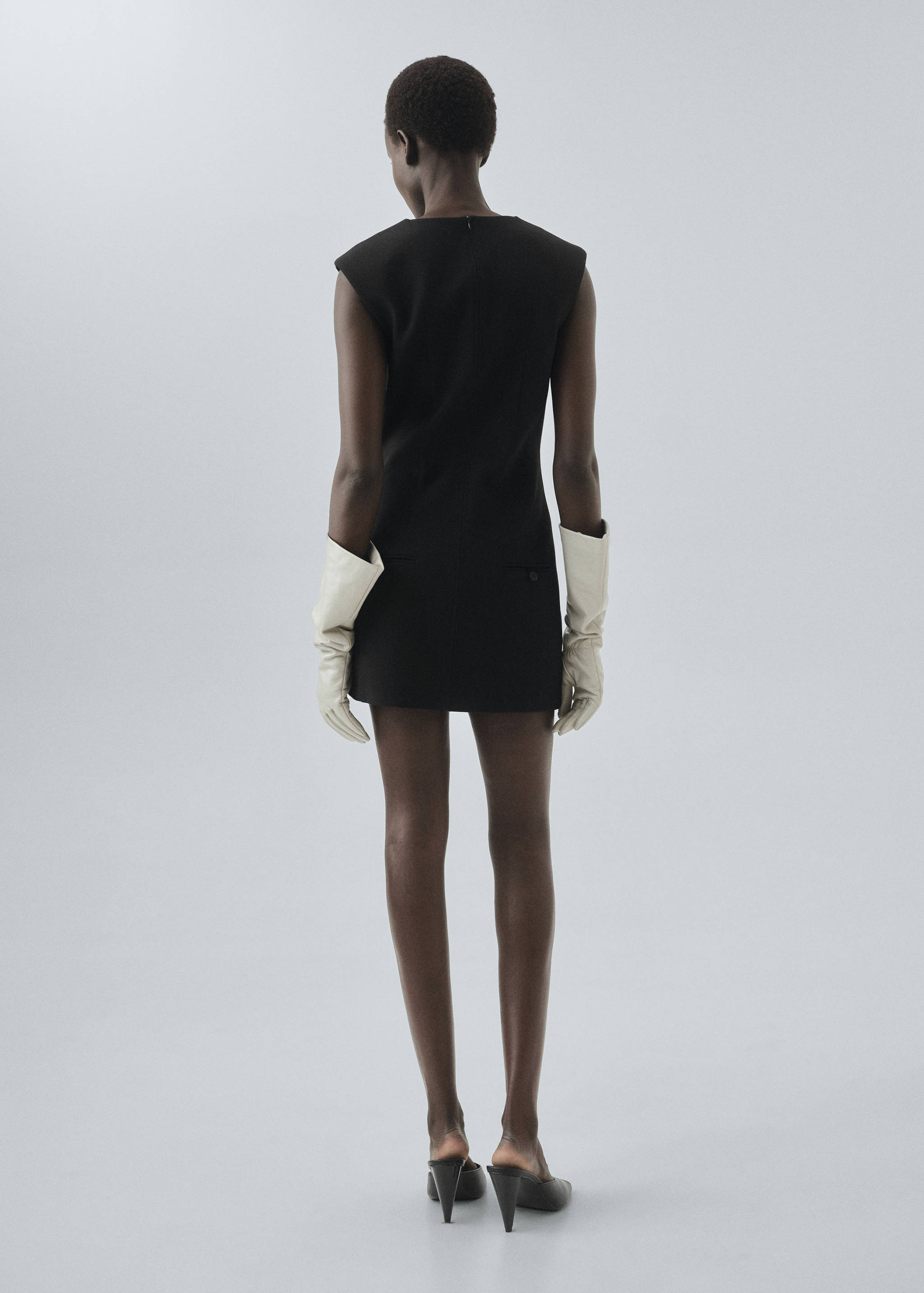 Dress with stitched pocket - Reverse of the article