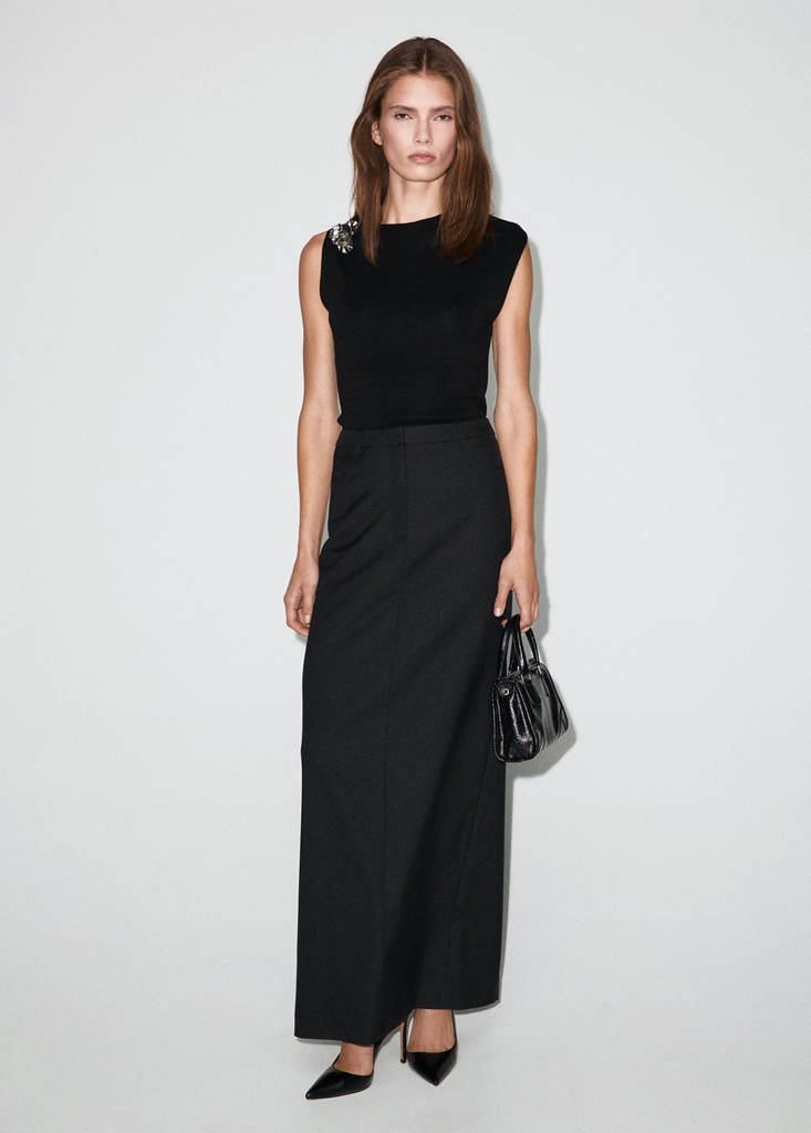 Knitted top with metallic flower — Black