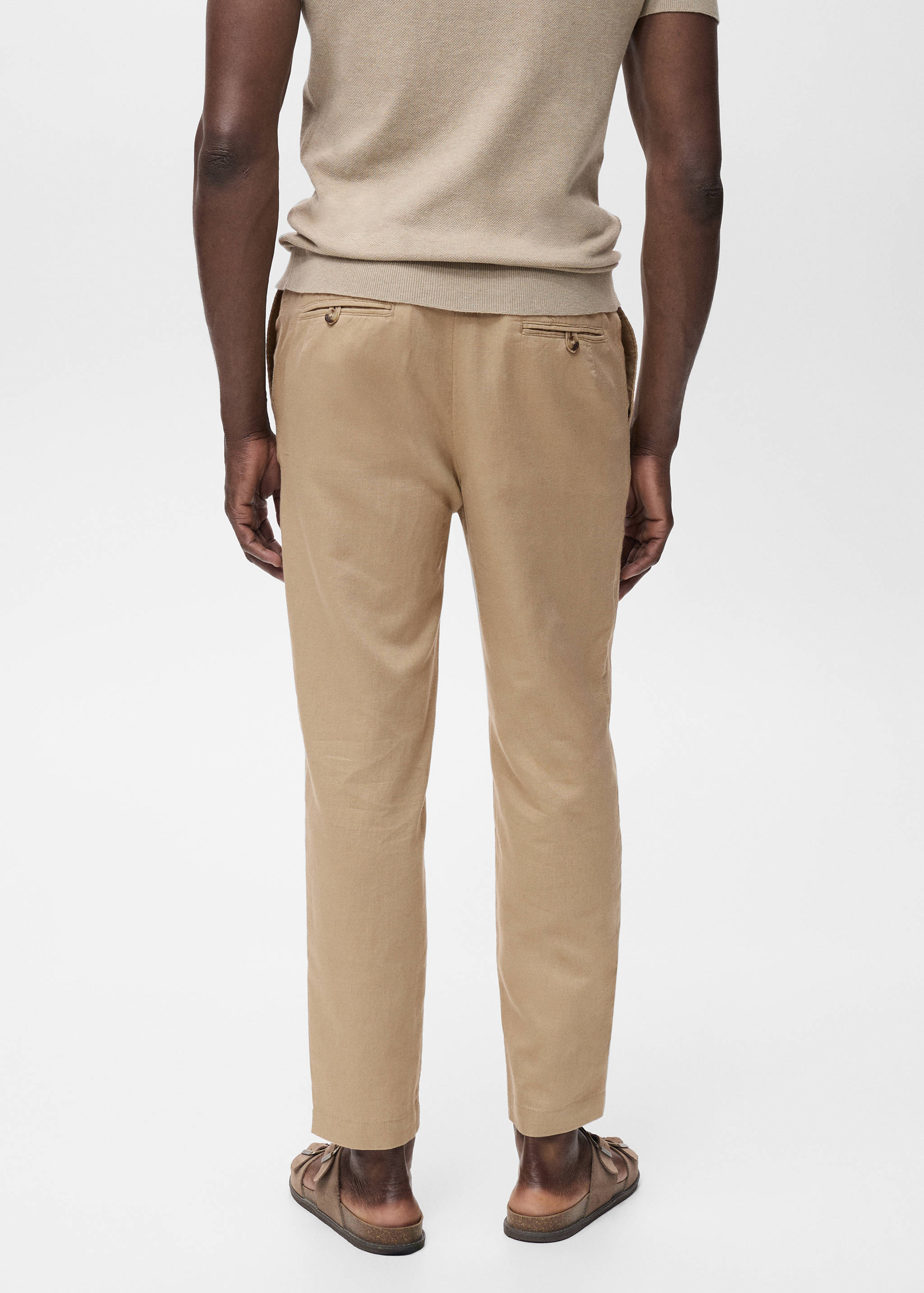 Slim-fit trousers with drawstring - Reverse of the article