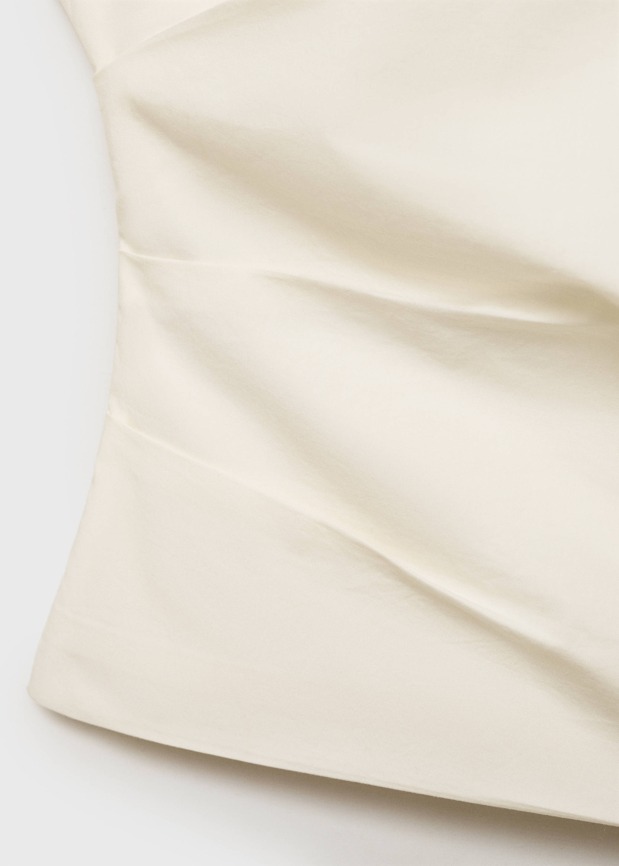 Ασύμμετρο τοπ με κεντημένο λουλούδι - Λεπτομέρεια του προϊόντος 0