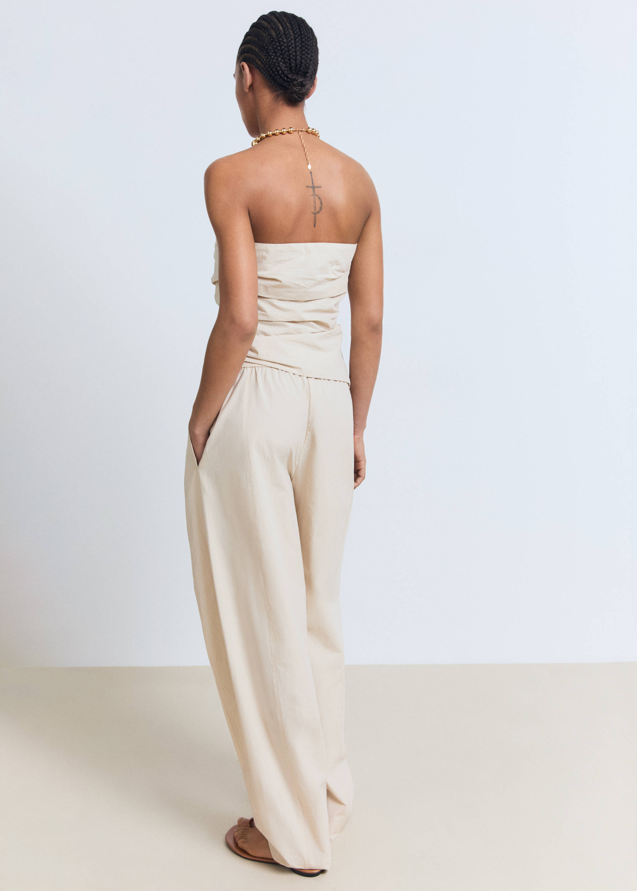 Cotton paperbag trousers - Reverse of the article