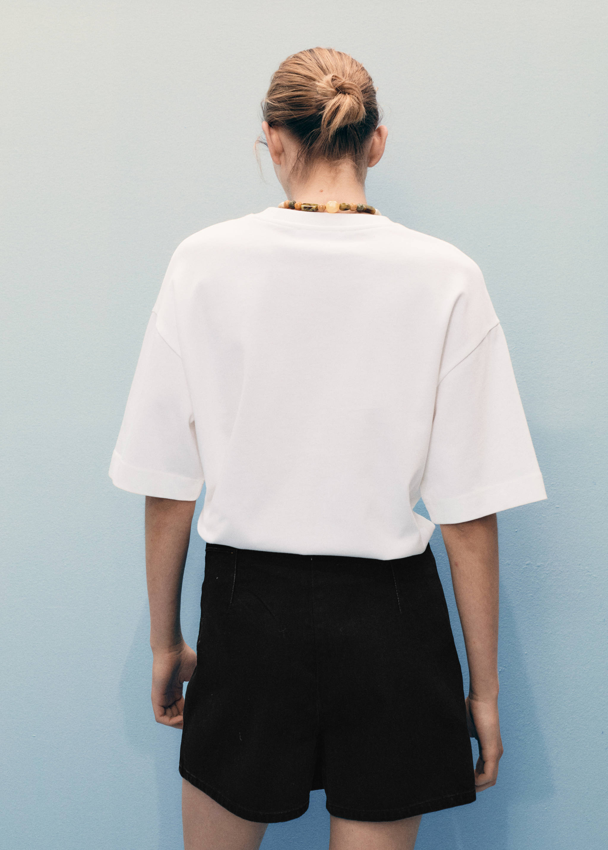 تنورة شورت دنيم كروس - الجهة الخلفية للمنتج