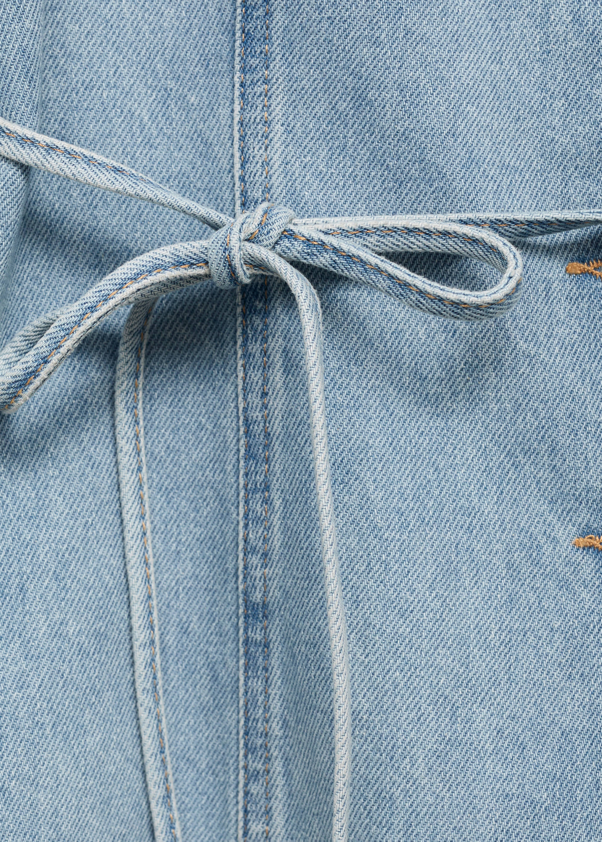 Buttoned denim vest - Details of the article 0
