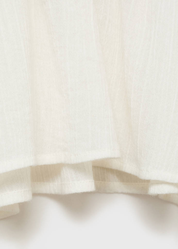 Halter top with ruffled detail — Ecru