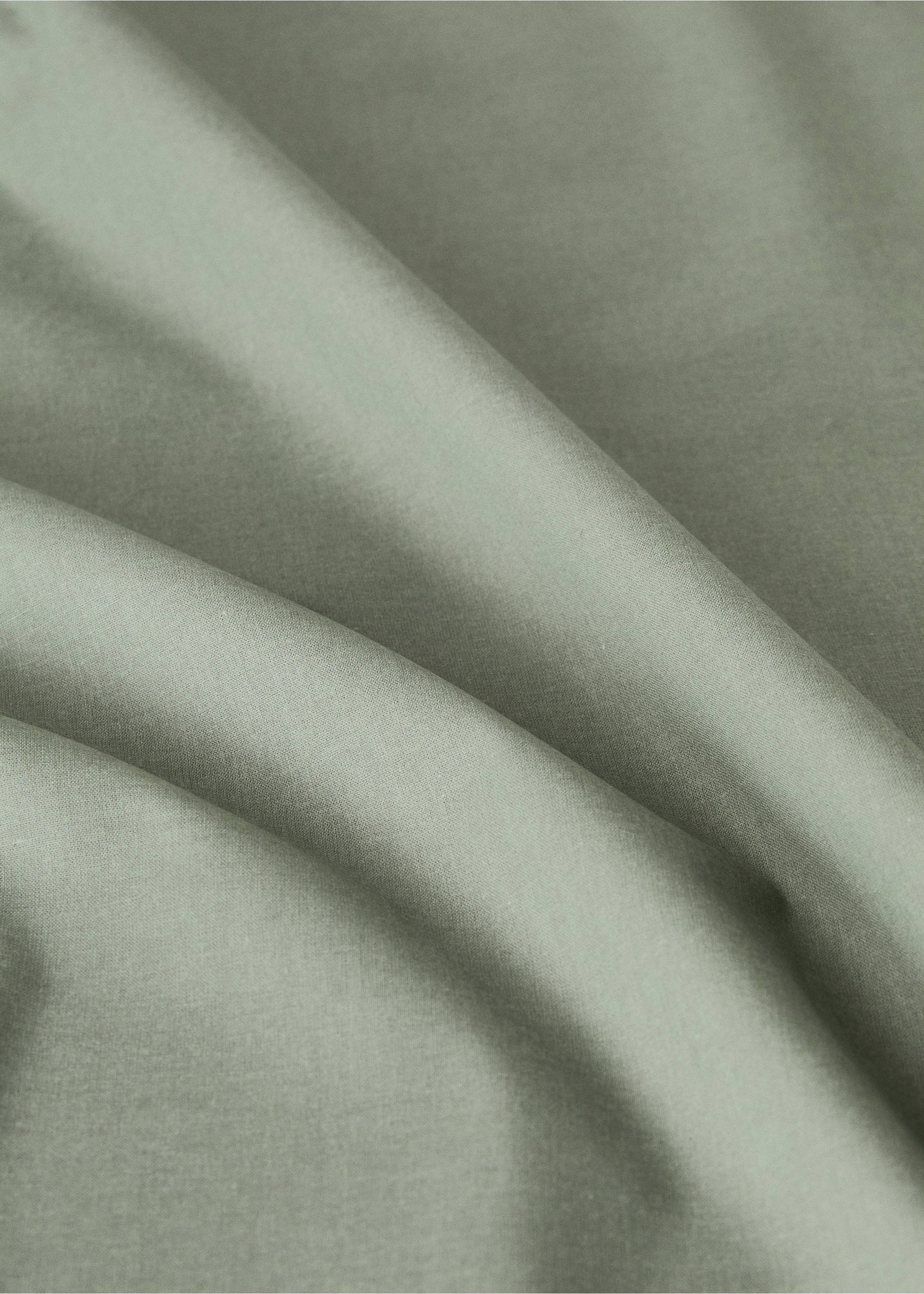 Resin-coated cotton tablecloth with overlock stitching for 6 to 8 diners - Details of the article 2, Medium Green. Ref: 17071585-00.