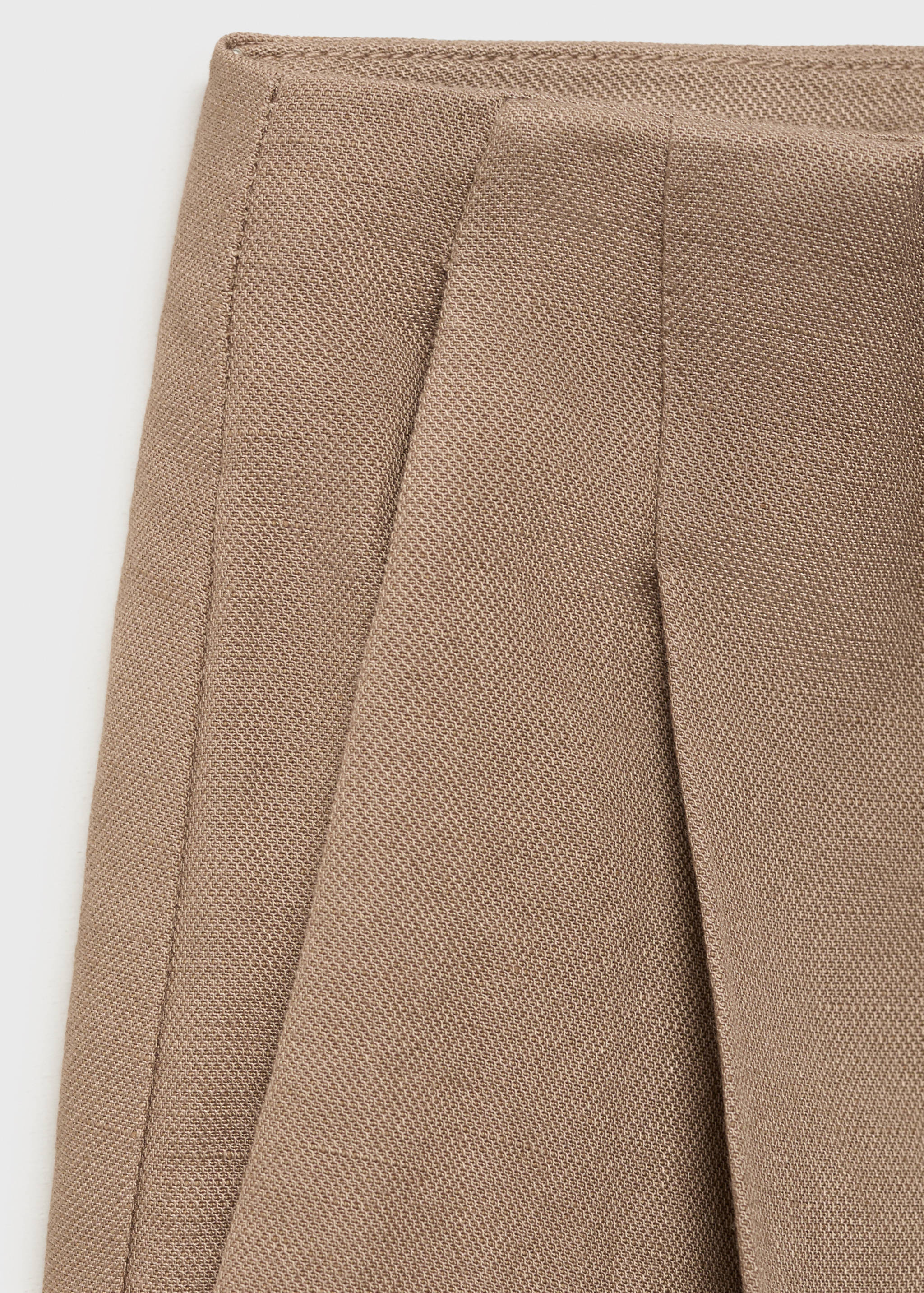 Calções bermudas de linho - Pormenor do artigo 8