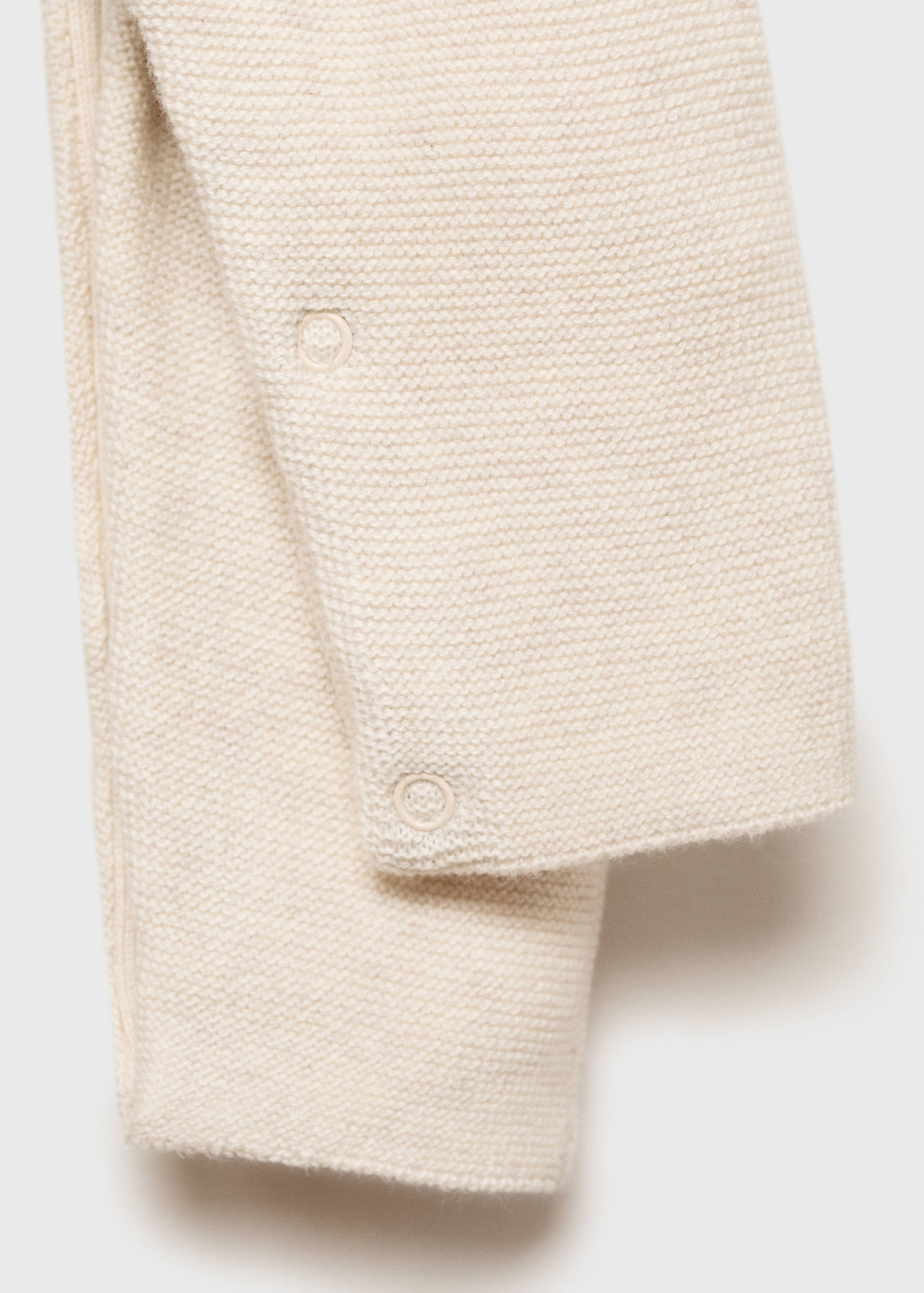 Long knitted dungarees - Details of the article 0