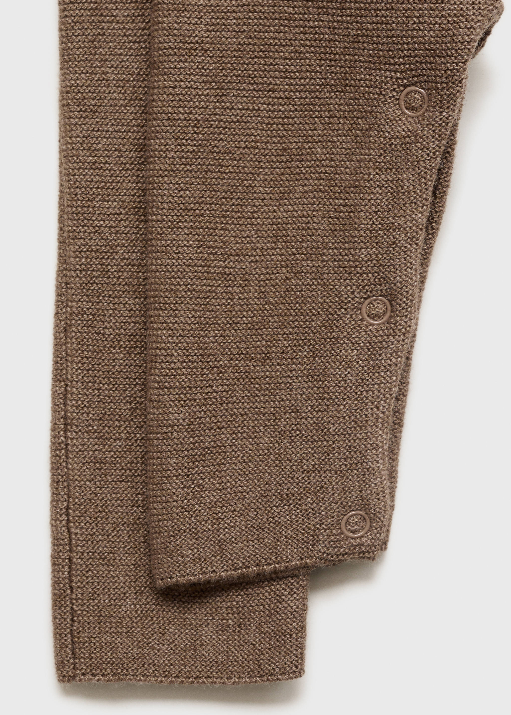 Long knitted dungarees - Details of the article 0