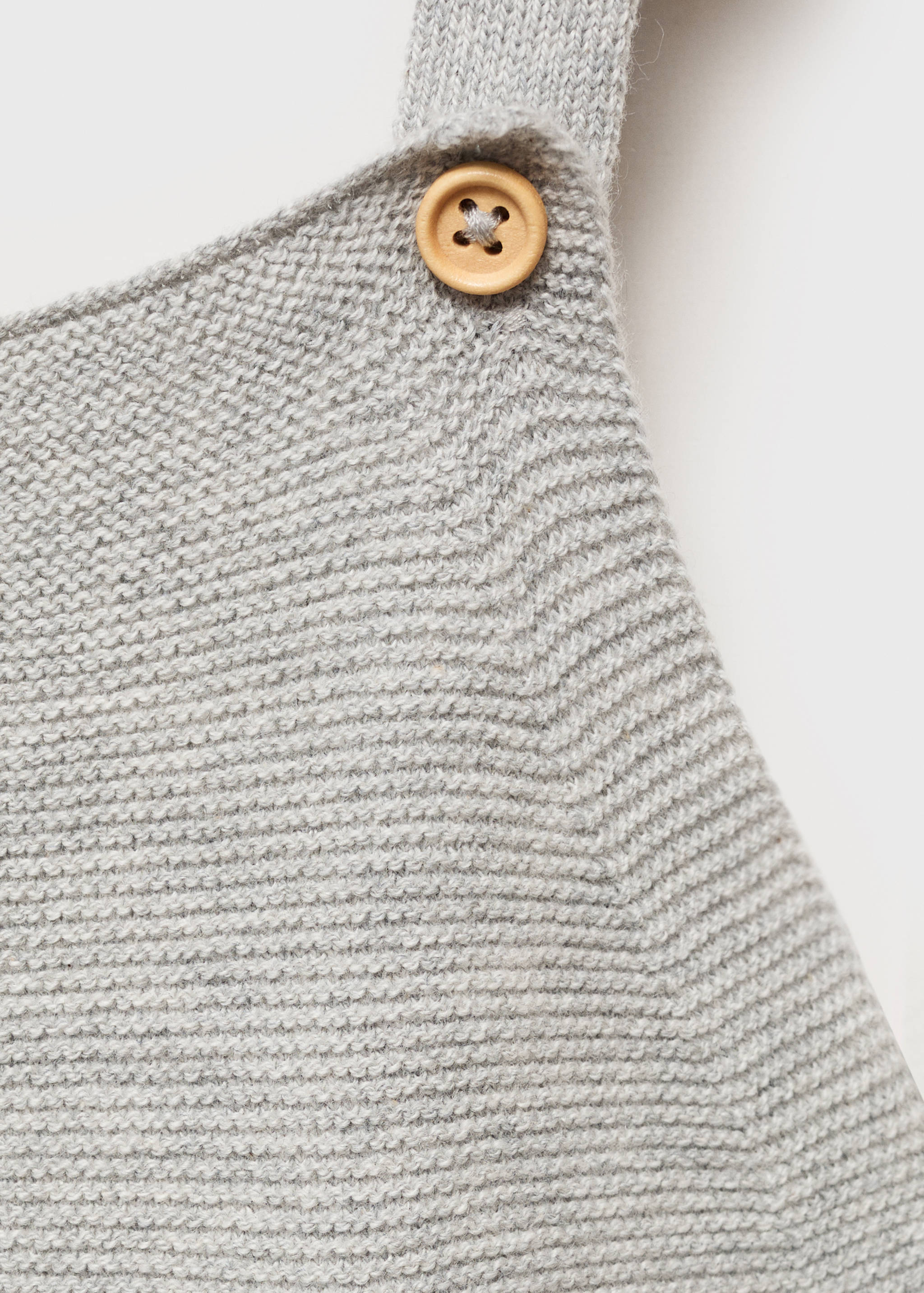 Long knitted dungarees - Details of the article 0