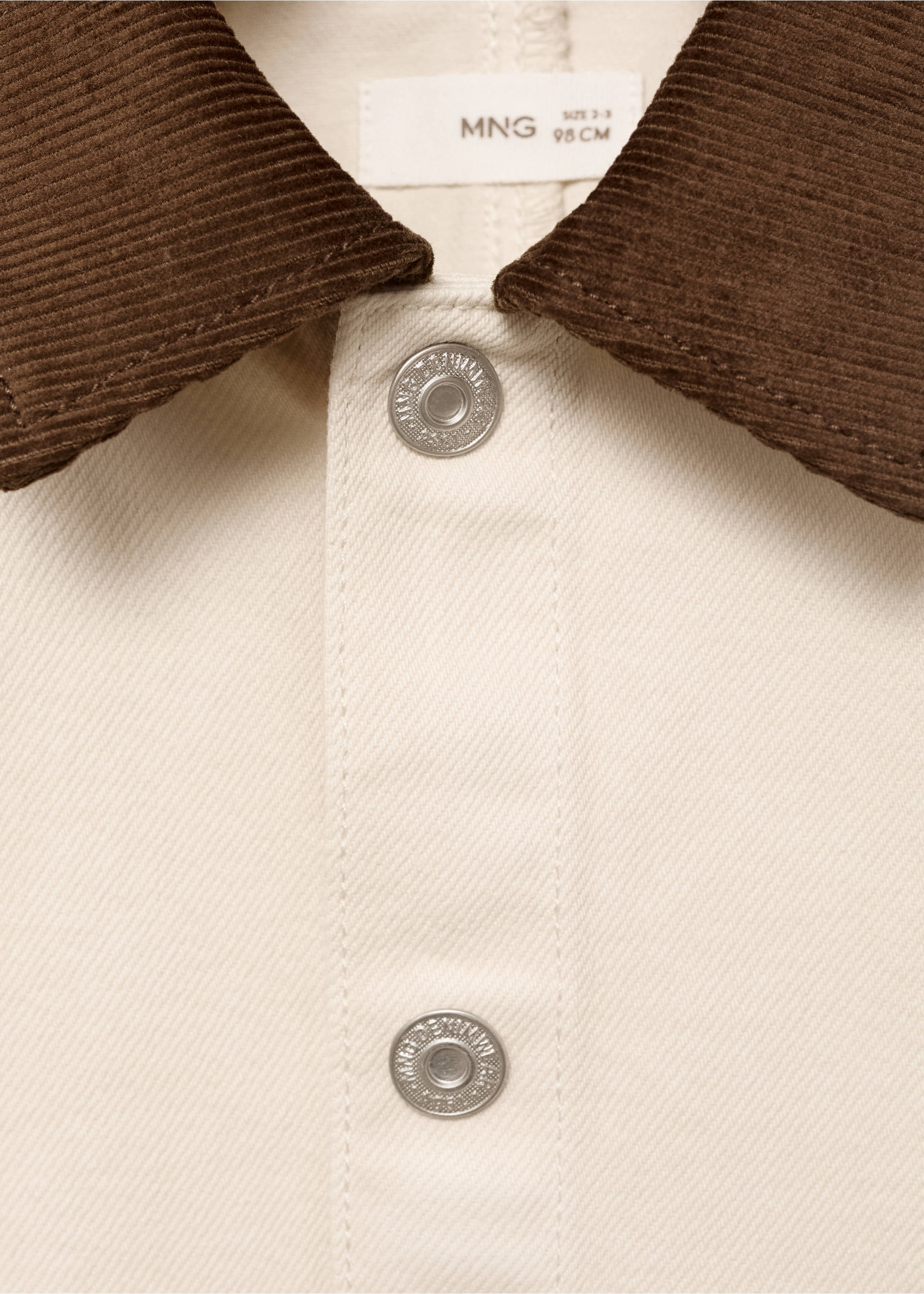 Close-up of a beige jacket featuring a brown corduroy collar and metal buttons., Sand. Ref: 17073303-00.