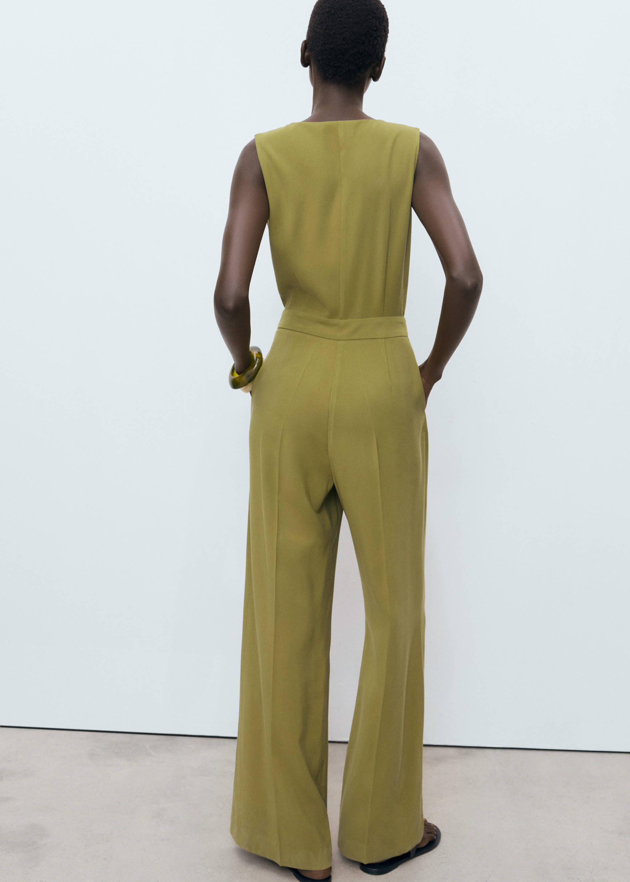 Long chest-pocket jumpsuit - Reverse of the article