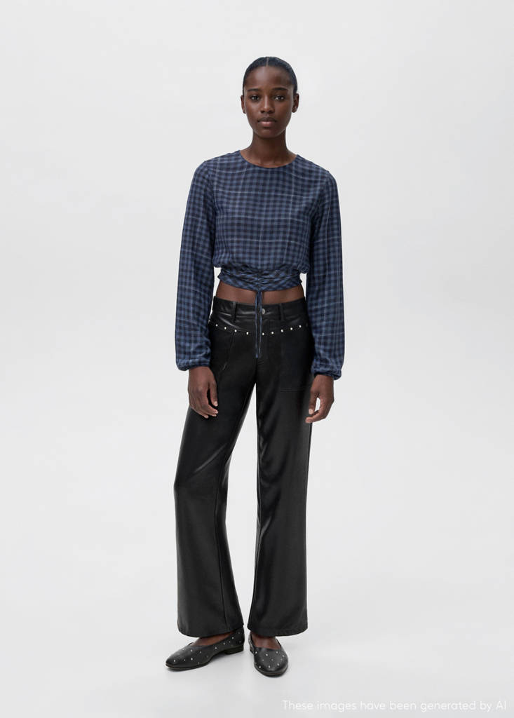Studded leather-effect trousers — Black