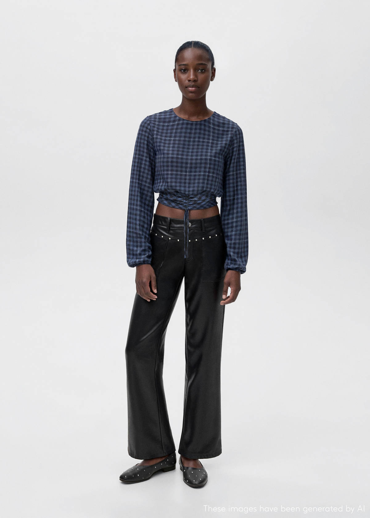 Studded leather-effect trousers — Black