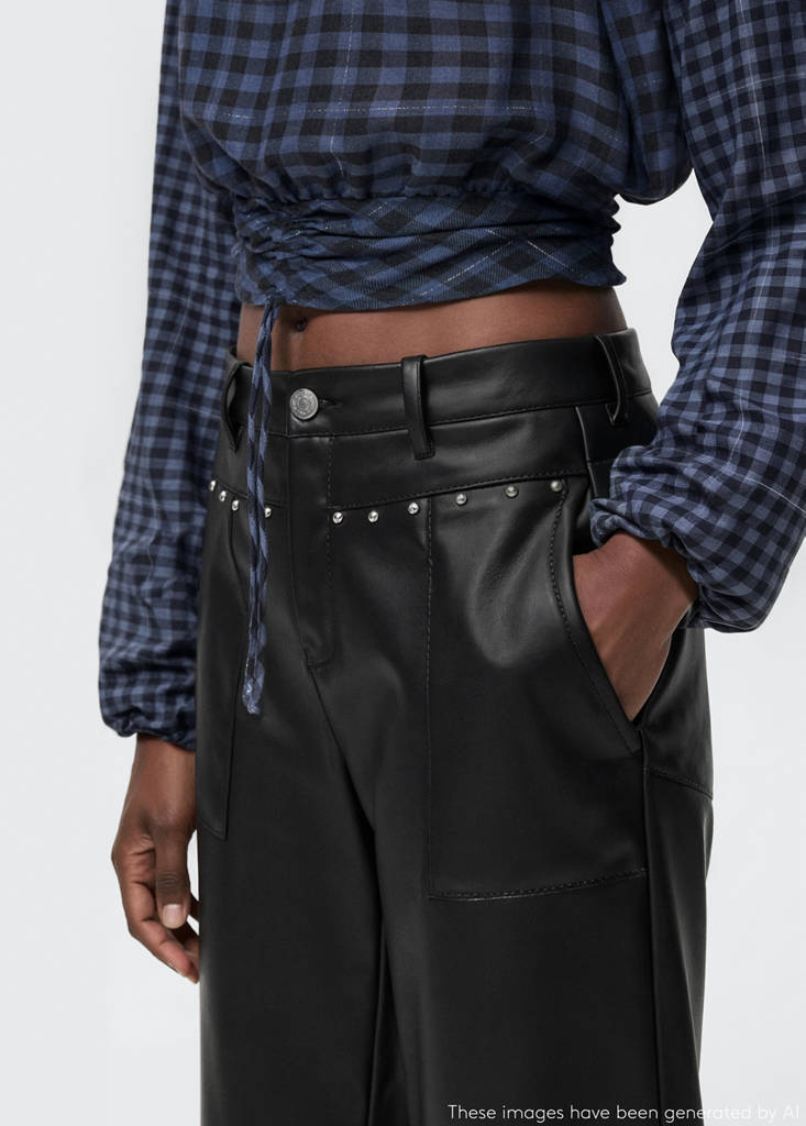 Studded leather-effect trousers — Black