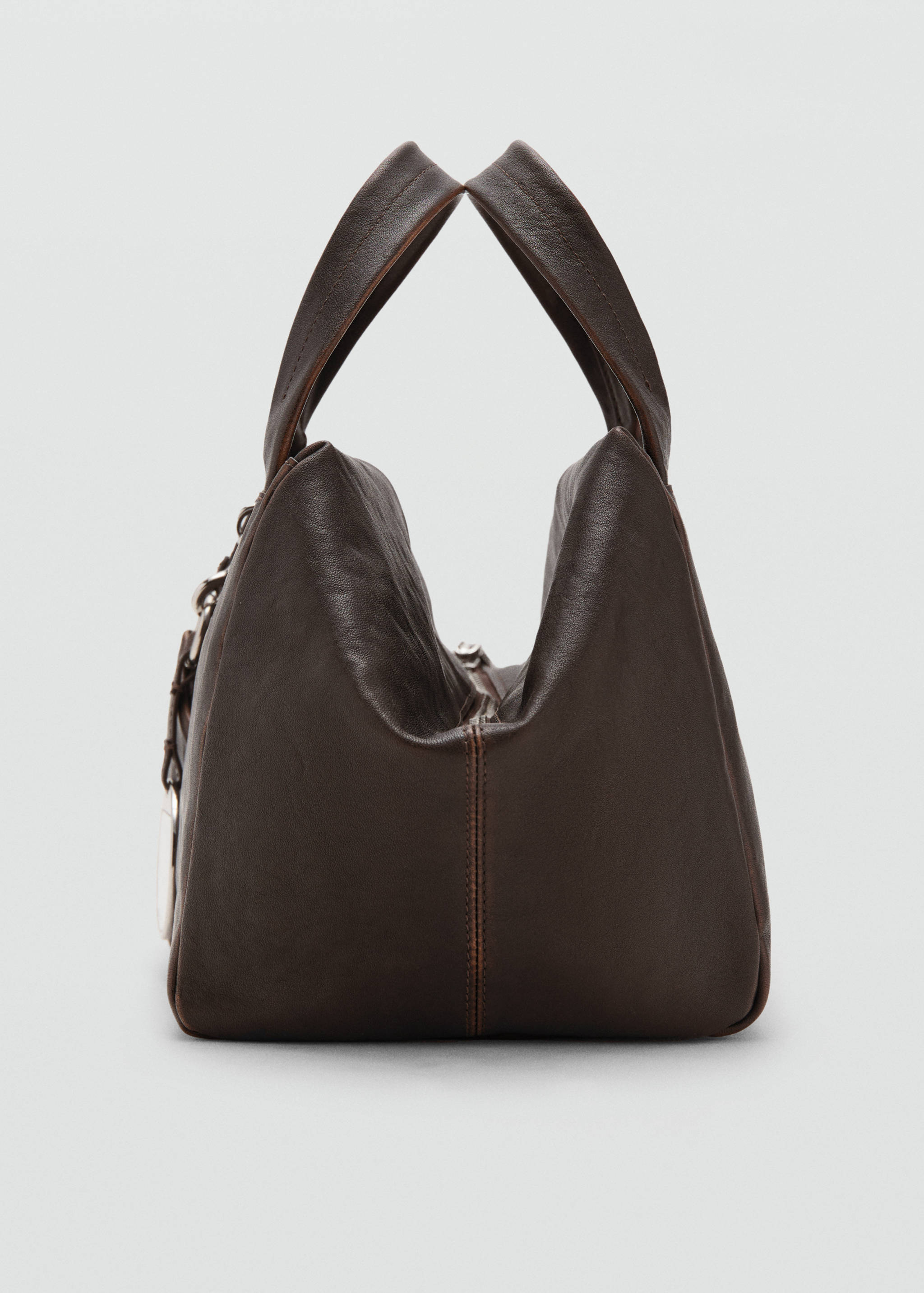 Leather clutch bag with charms - Details of the article 1