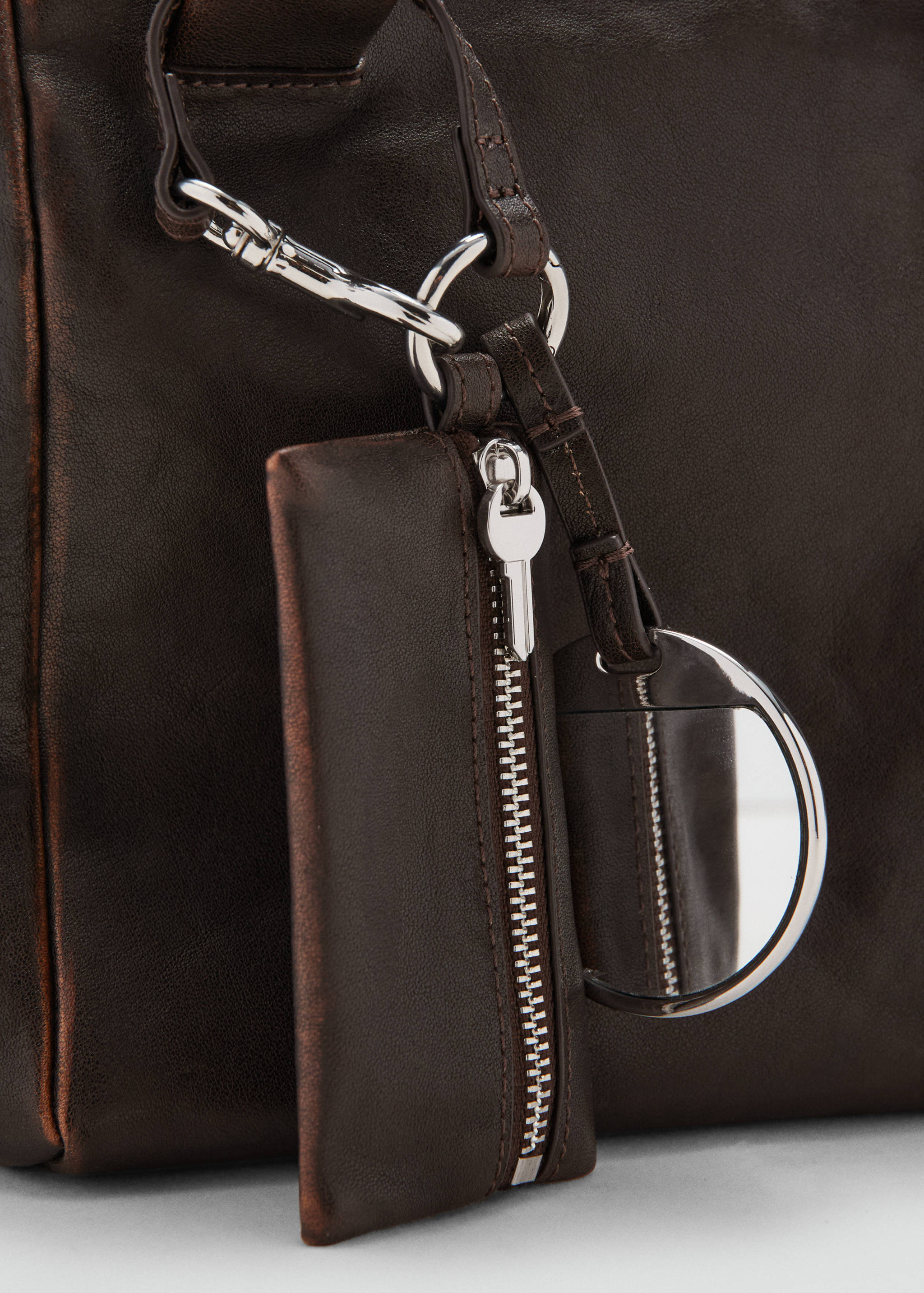 Leather clutch bag with charms - Details of the article 2