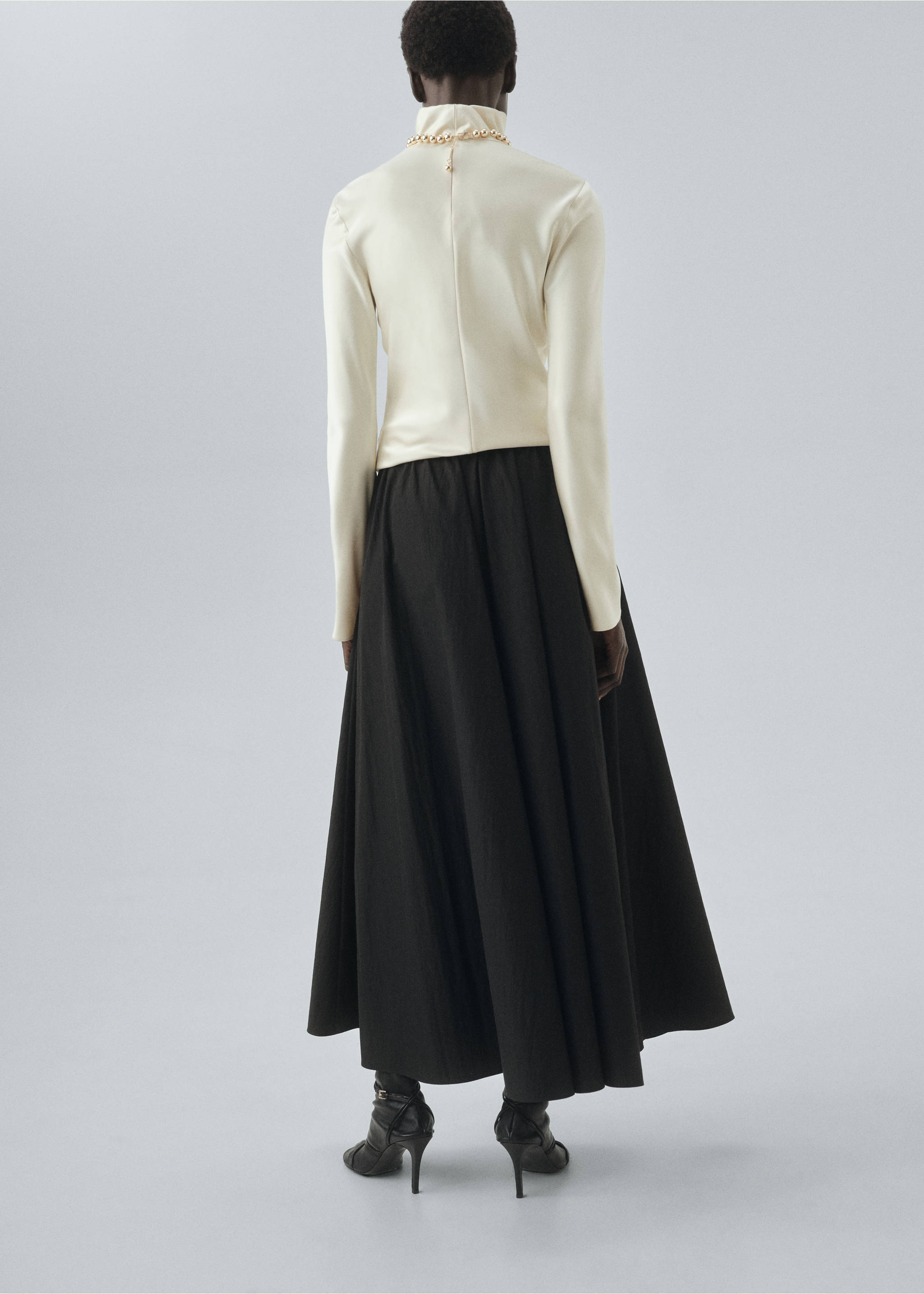 Long flared skirt - Reverse of the article, Black. Ref: 17076355-00.