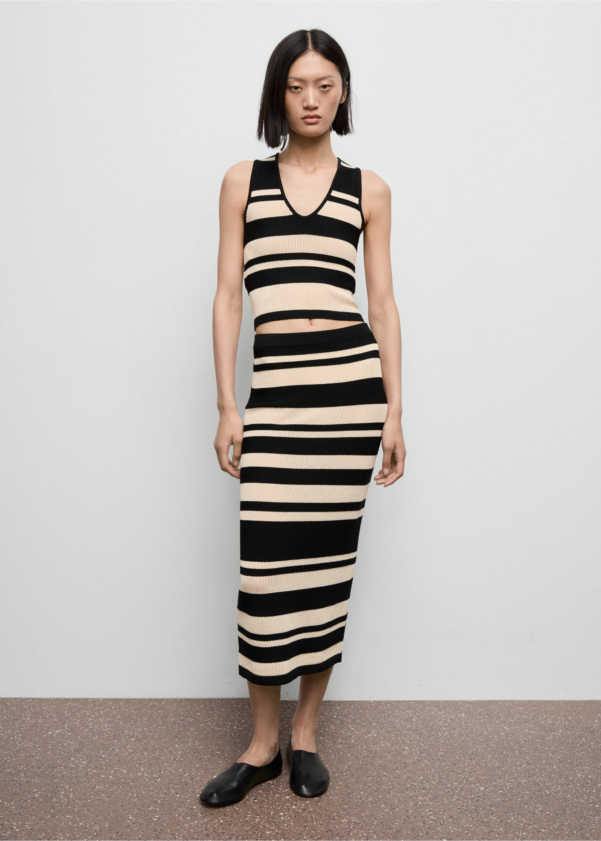 Jupe midi en maille à rayures - Plan général, Noir. Ref: 17076728-00.