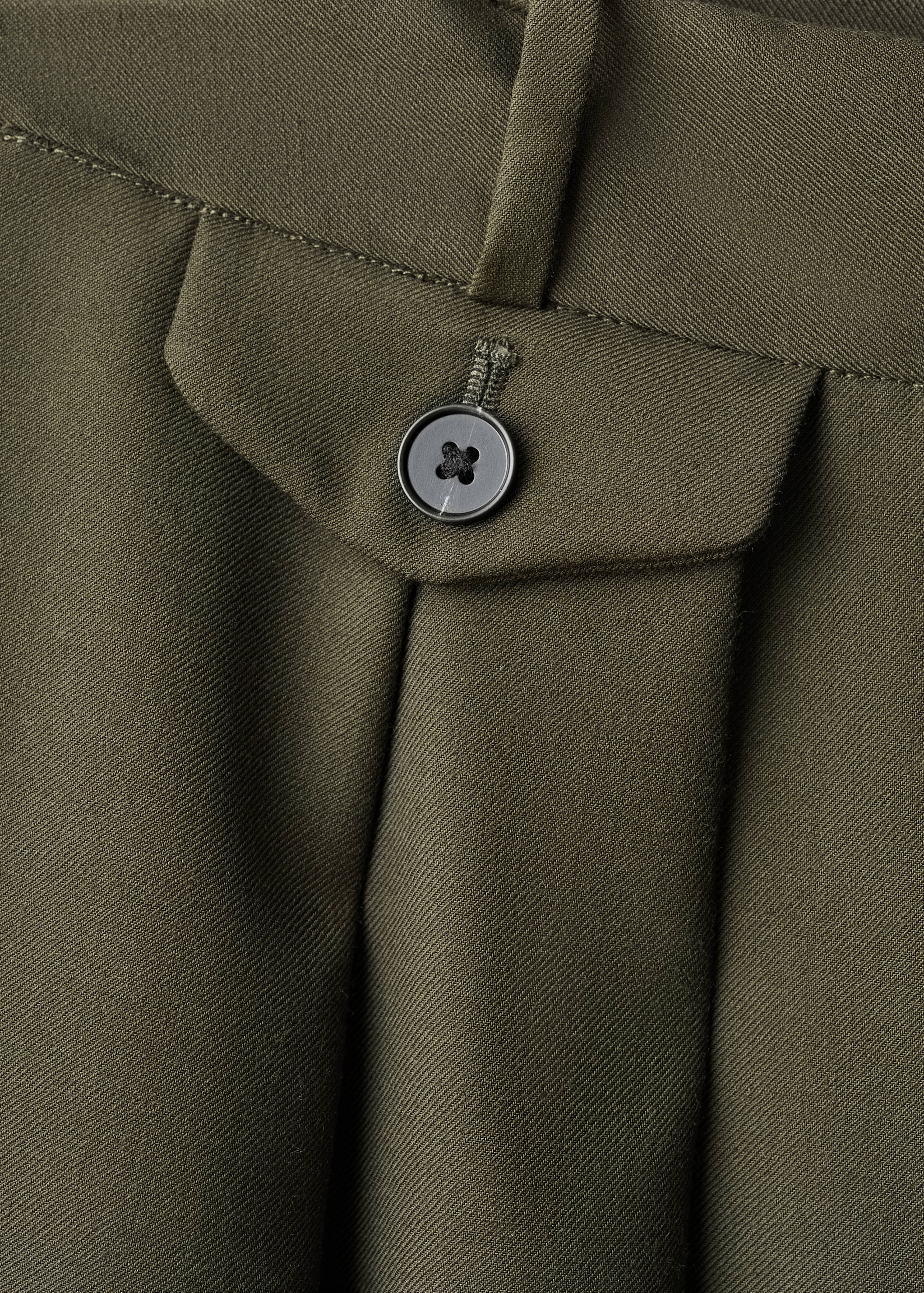 Pleated trousers with button detail - Details of the article 0