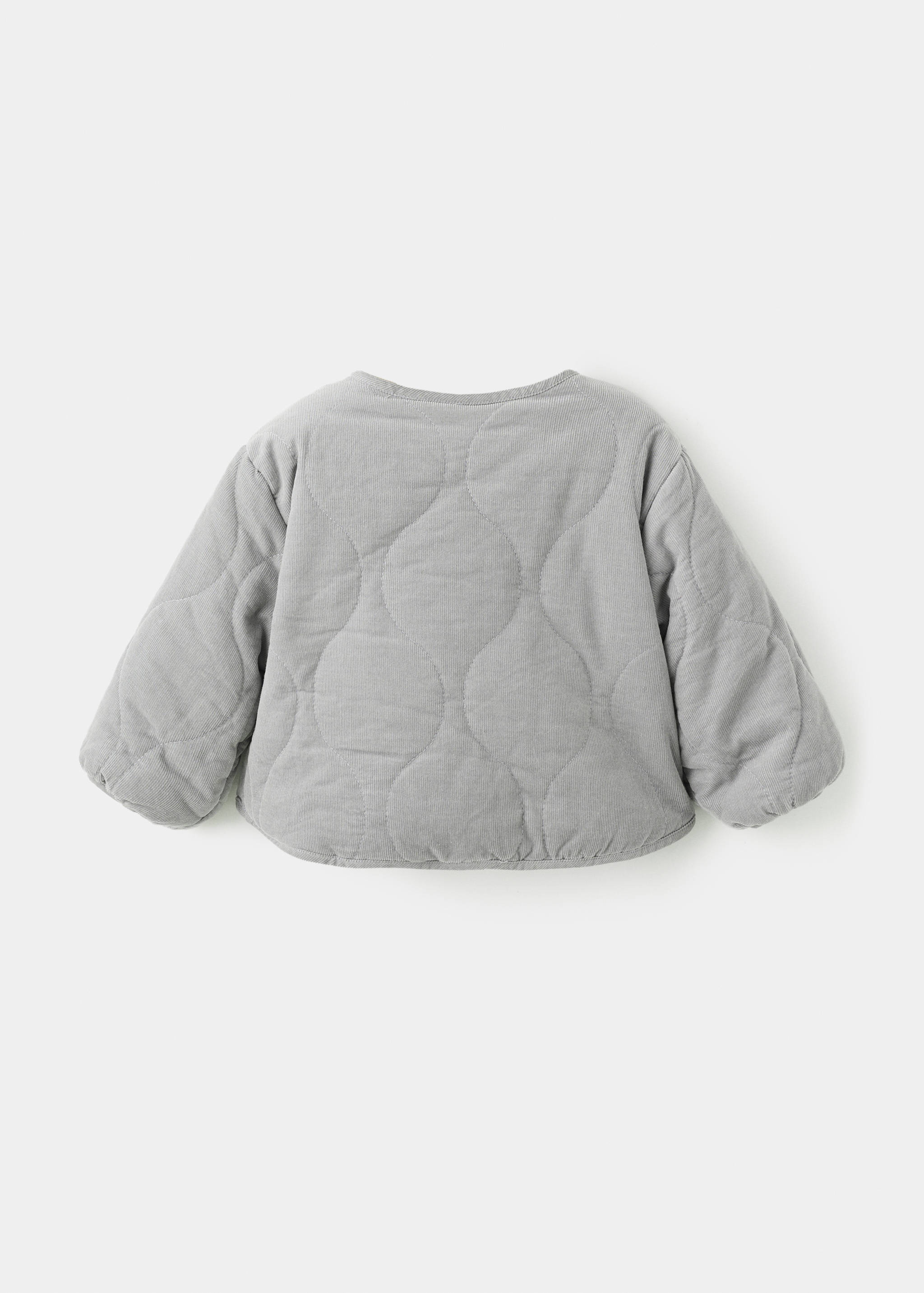 Corduroy quilted coat - Reverse of the article