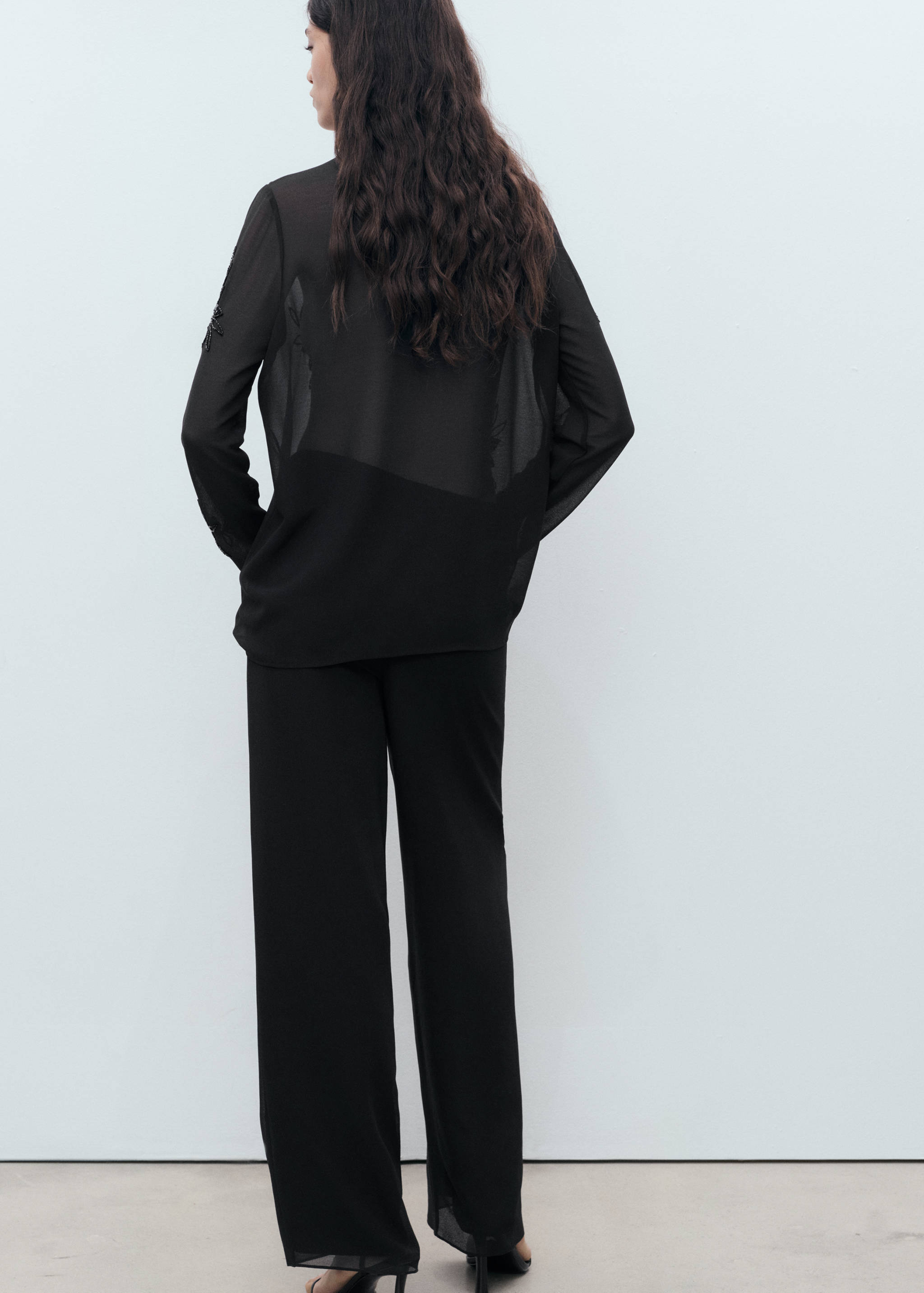 Semi-transparent shirt with rhinestone embroidery - Reverse of the article