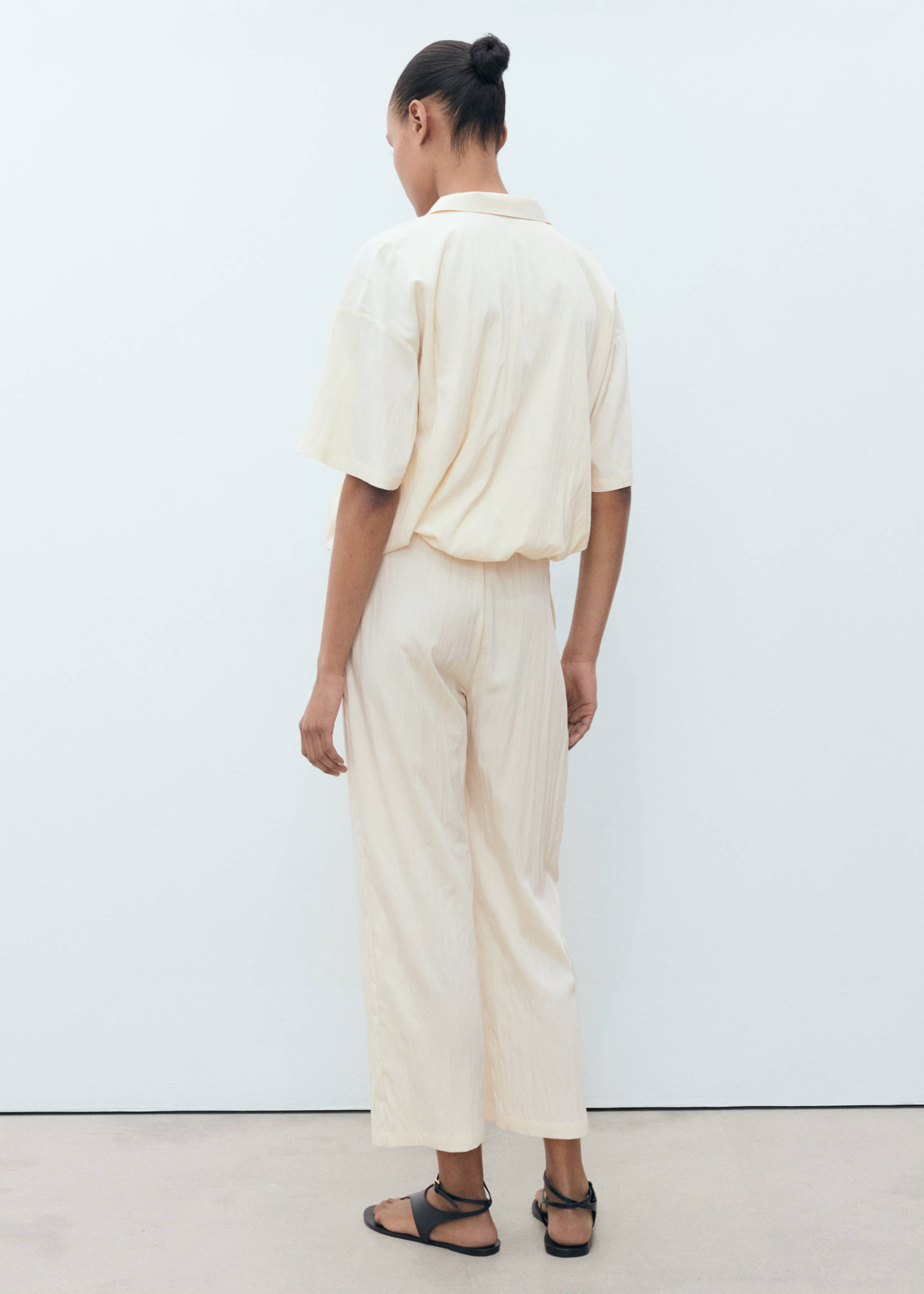 Textured crop trousers - Reverse of the article